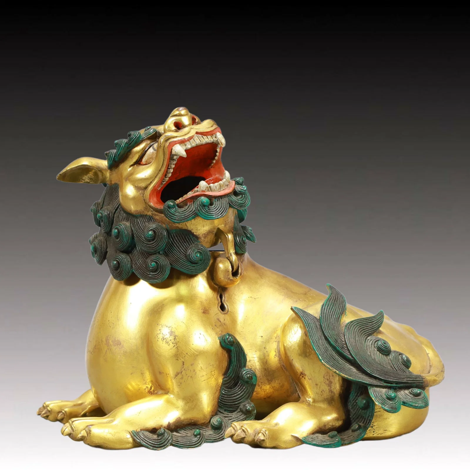 A Rare Gilt Bronze Lion Ornament