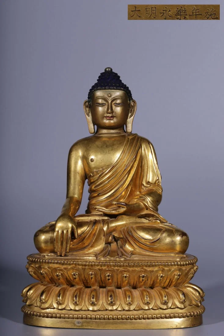 A Rare Gilt Bronze Statue of Sakyamuni