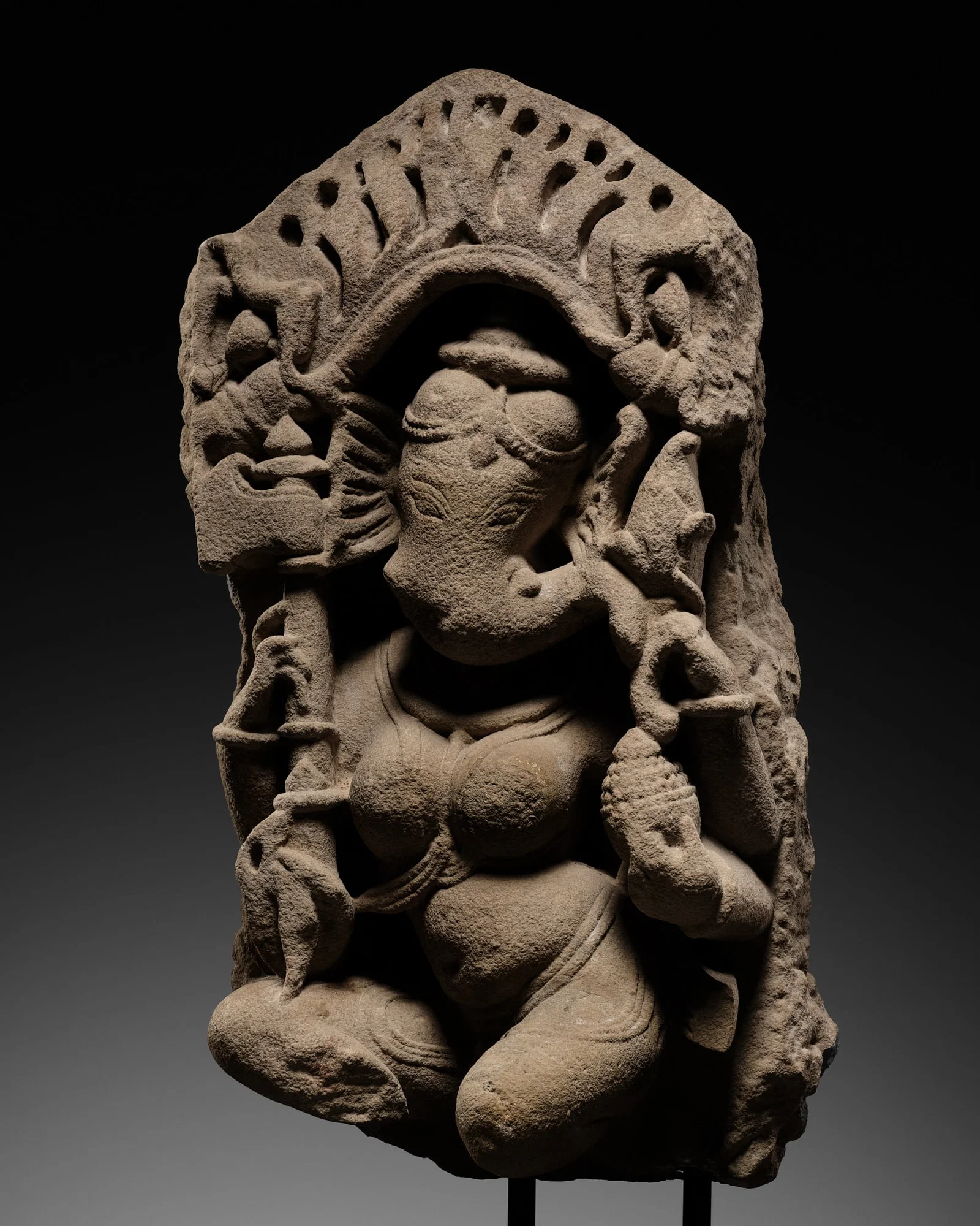 A RARE SANDSTONE FIGURE OF VINAYAKI, THE FEMALE FORM OF GANESHA, RAJASTHAN OR MADHYA PRADESH,