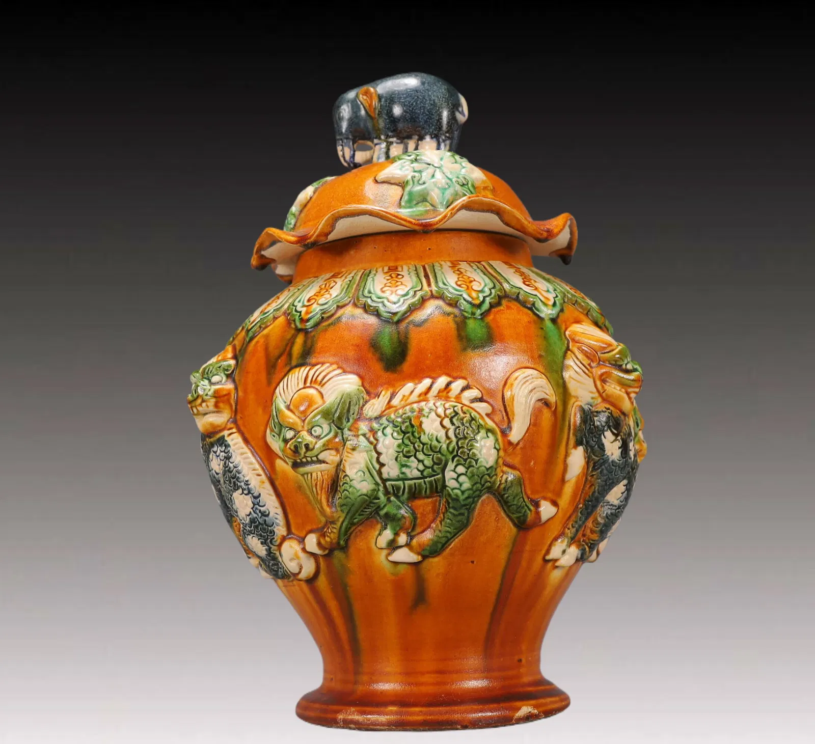 A Rare Tang Tri-Color Glazed Pottery Auspicious Beast Pattern Cover Jar