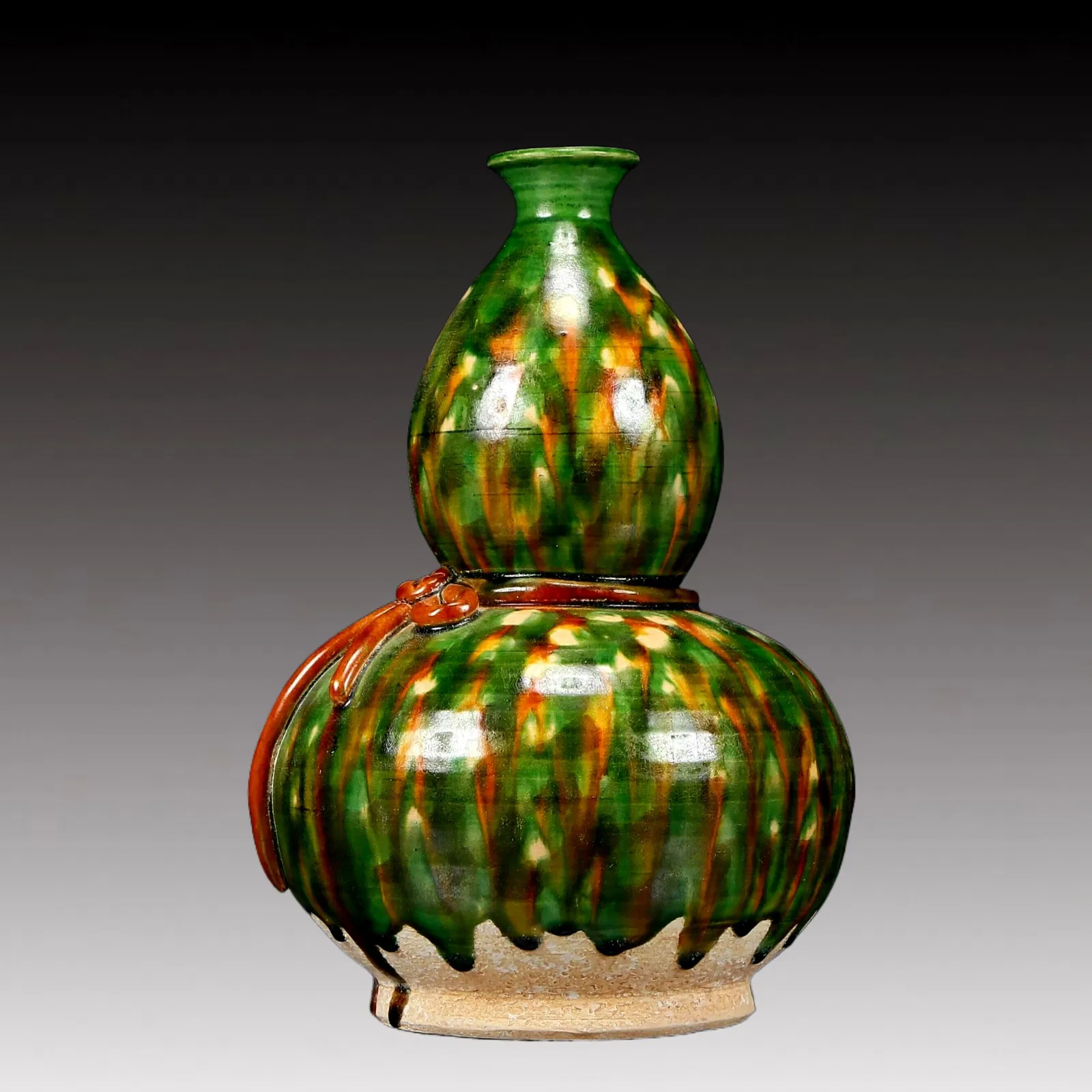A Rare Tang Tri-Color Glazed Pottery Gourd-Shaped Vase