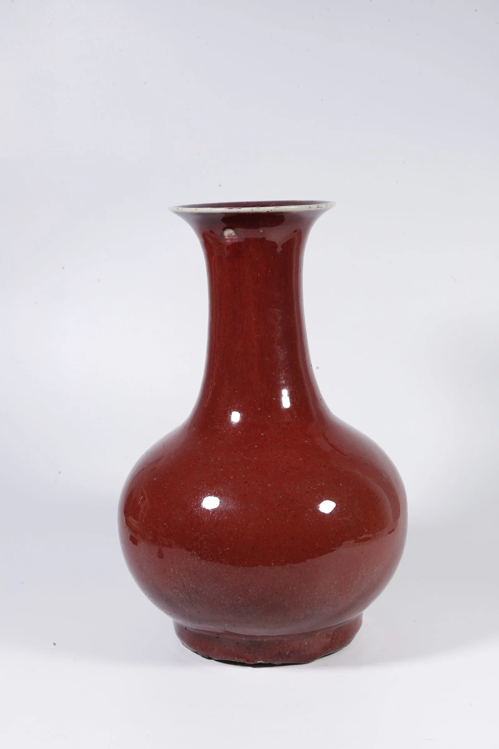 A RED-GLAZED PRIZE VASE