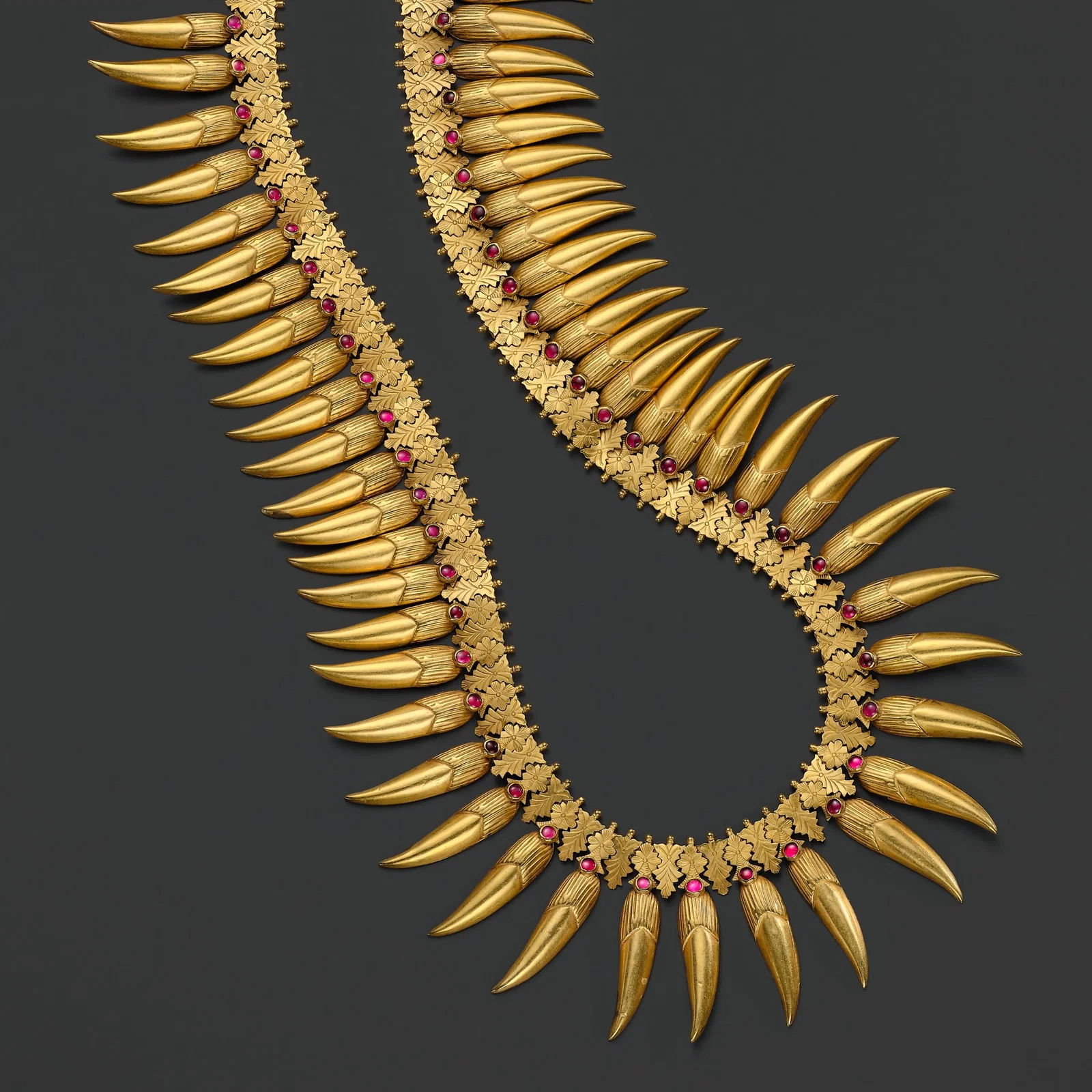 A RUBY-INSET 18 CARAT GOLD (292 GRAMS) 'JASMINE BUD' BRIDAL NECKLACE, MALLIGAI ARUMBU MALAI, TAMIL