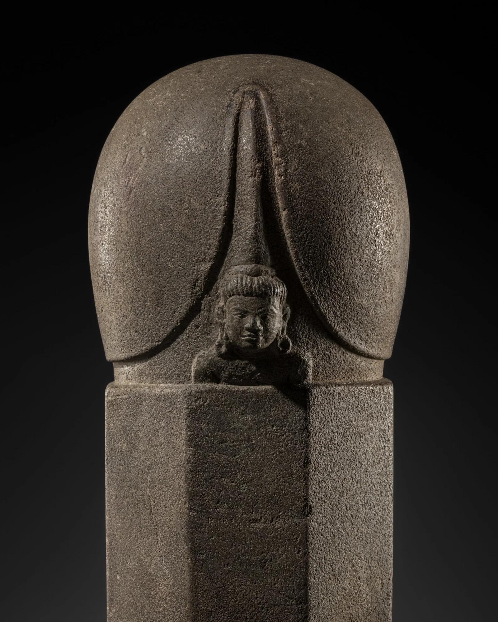 A SANDSTONE 'SHIVA' EKAMUKHALINGA, KHMER, PRE-ANGKOR PERIOD, 7TH-8TH CENTURY