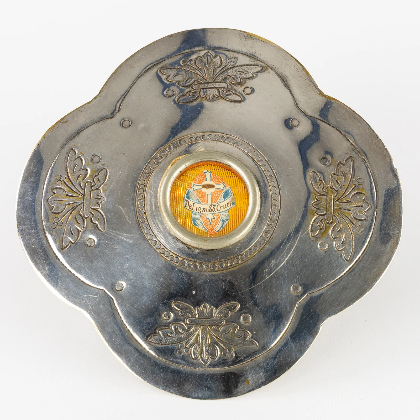 A Sealed theca with a Relic of the True Cross in an osculatorium, silver-plated metal. Including the