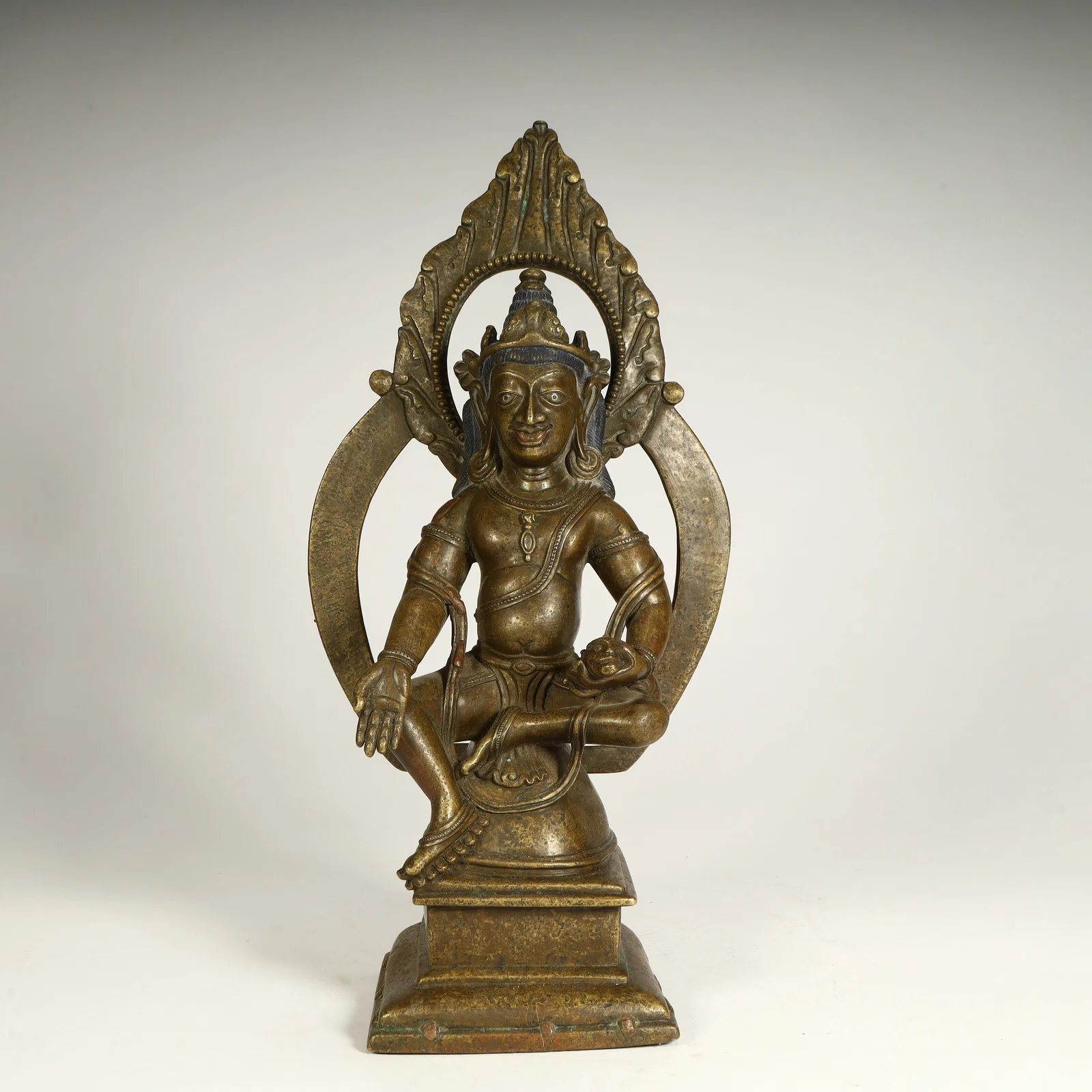 A seated statue of Guanyin in the bronze Ming Dynasty