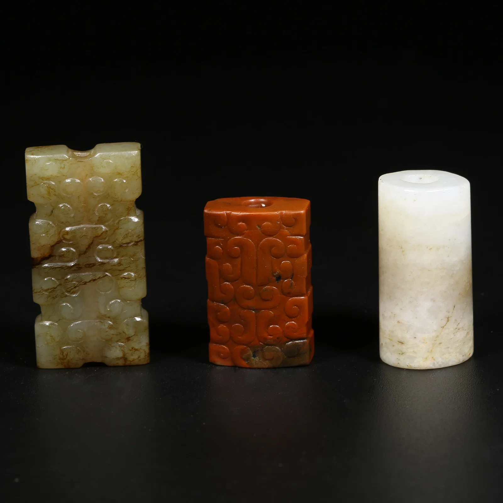 A SET OF ANCIENT JADE PENDANT FITTINGS