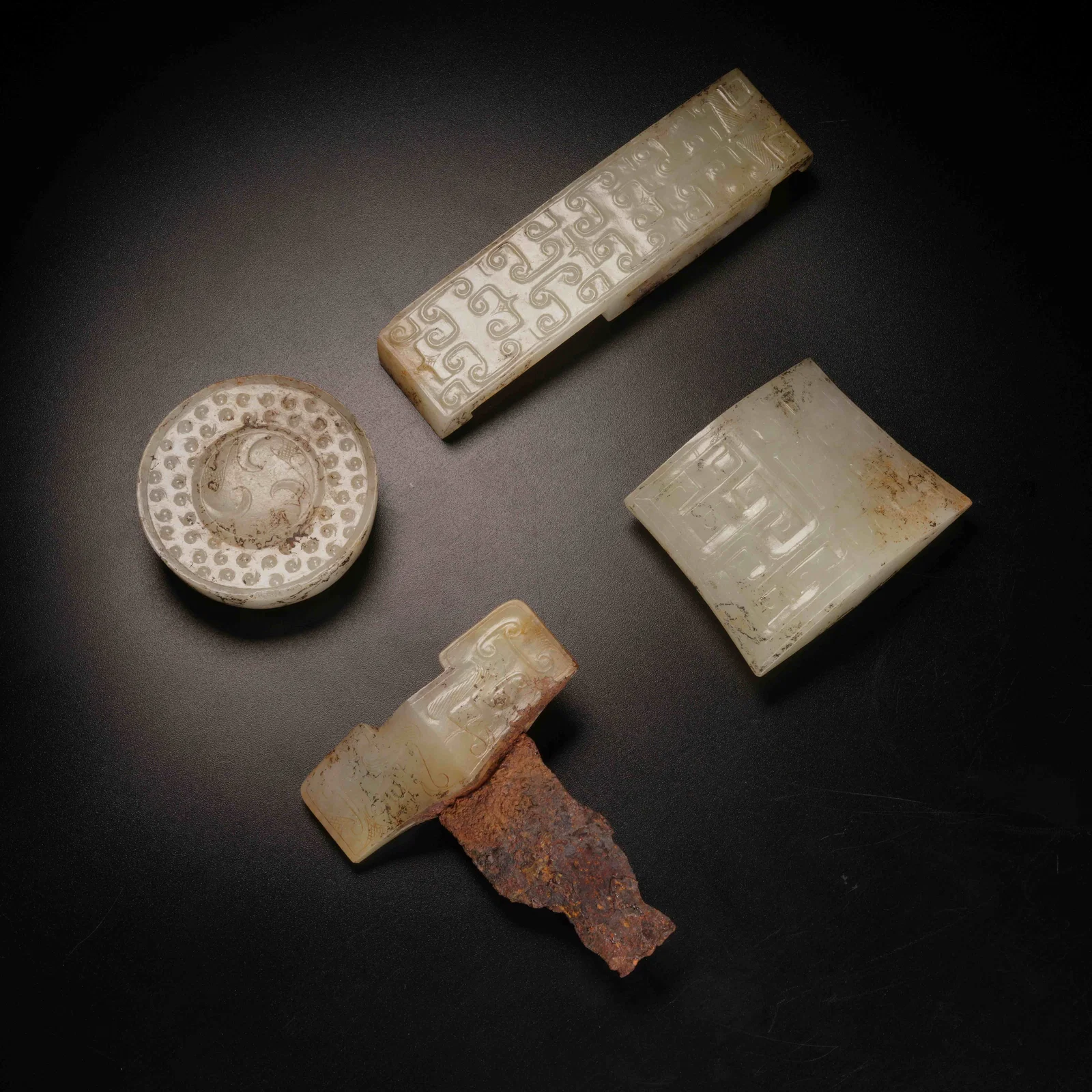 A SET OF ANCIENT JADE SWORD ORNAMENTS