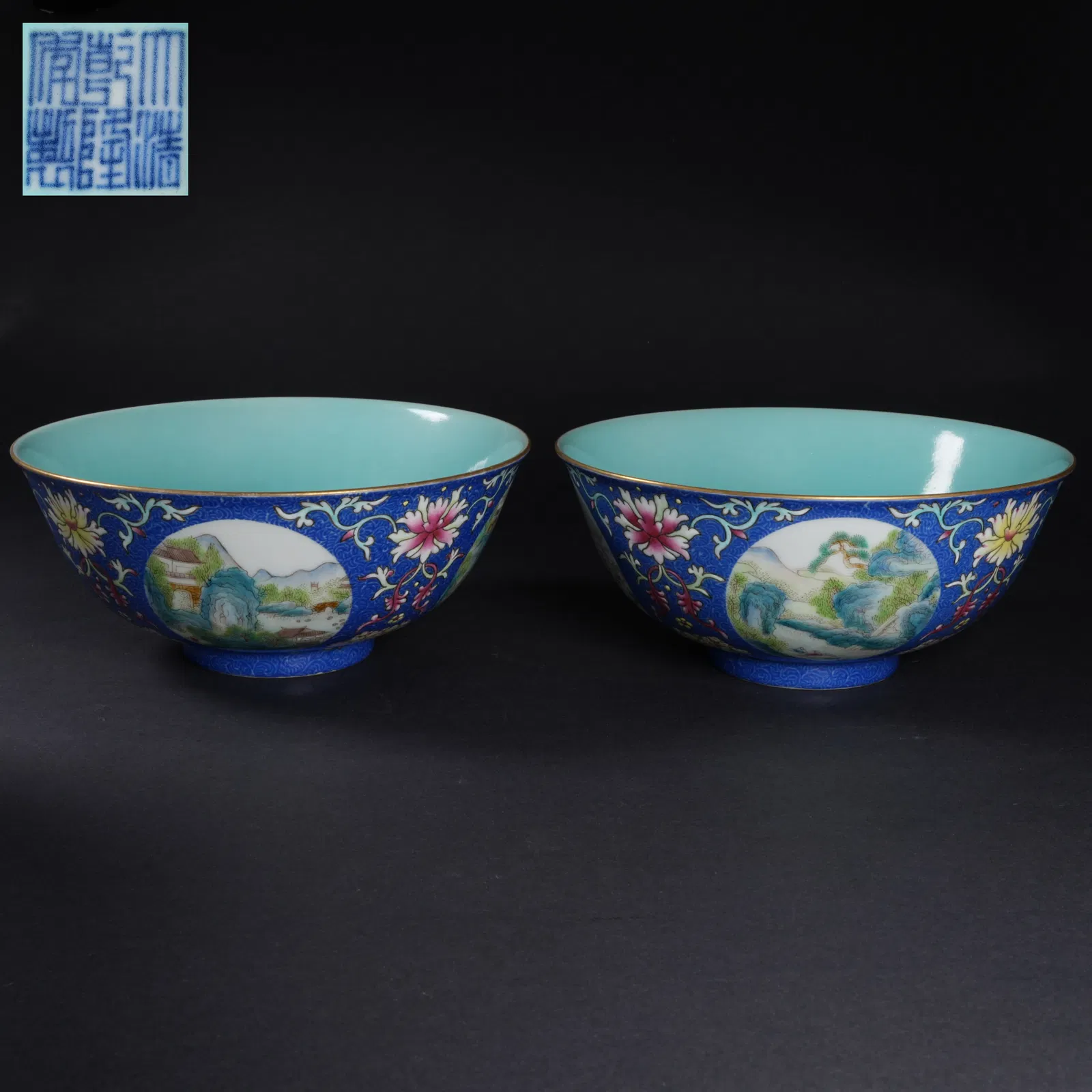 A SET OF BLUE-GROUND FAMILLE-ROSE LANDSCAPE MEDALLION BOWLS