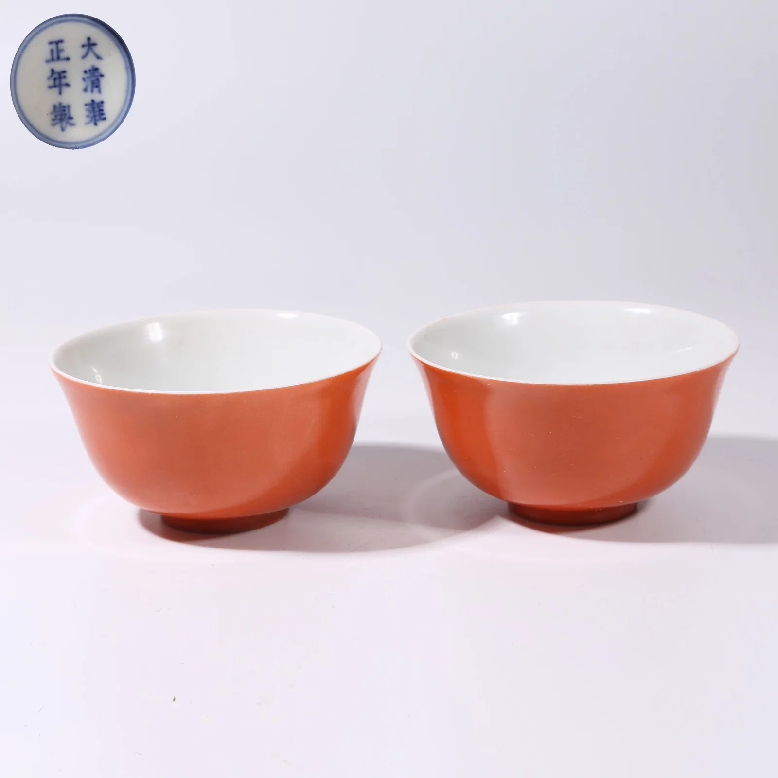 A SET OF CORAL-RED GLAZE CUPS