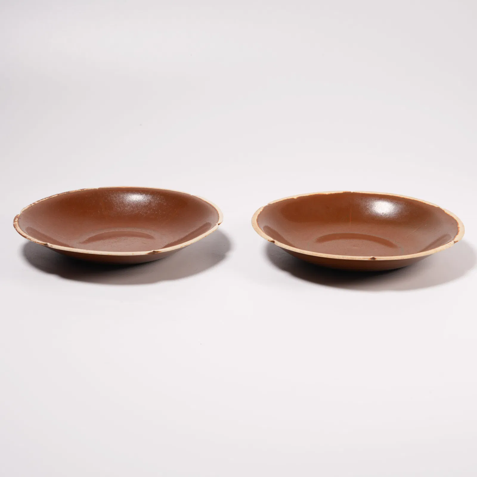 A SET OF DING WARE FOLIATE-RIM WASHERS