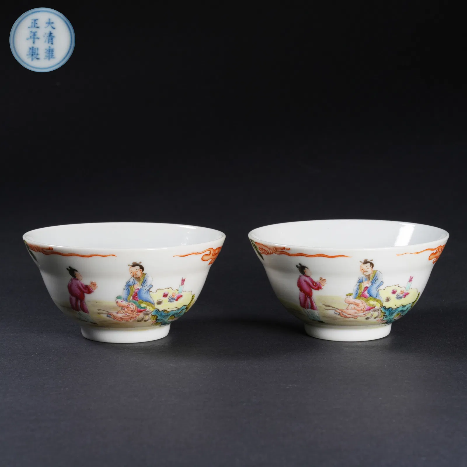 A SET OF FAMILLE-ROSE FIGURAL CUPS