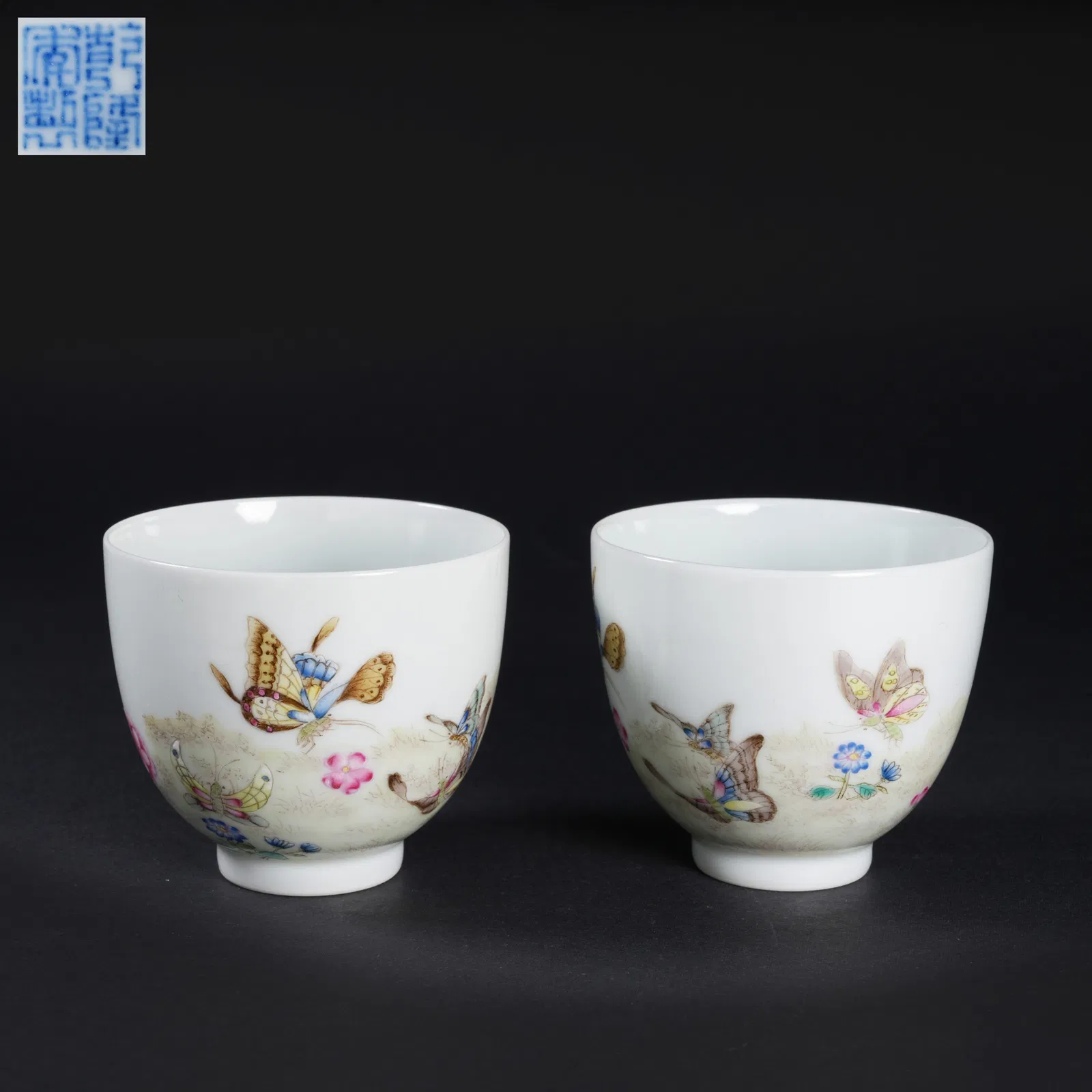A SET OF FAMILLE-ROSE FLOWER-AND-BUTTERFLY CUPS