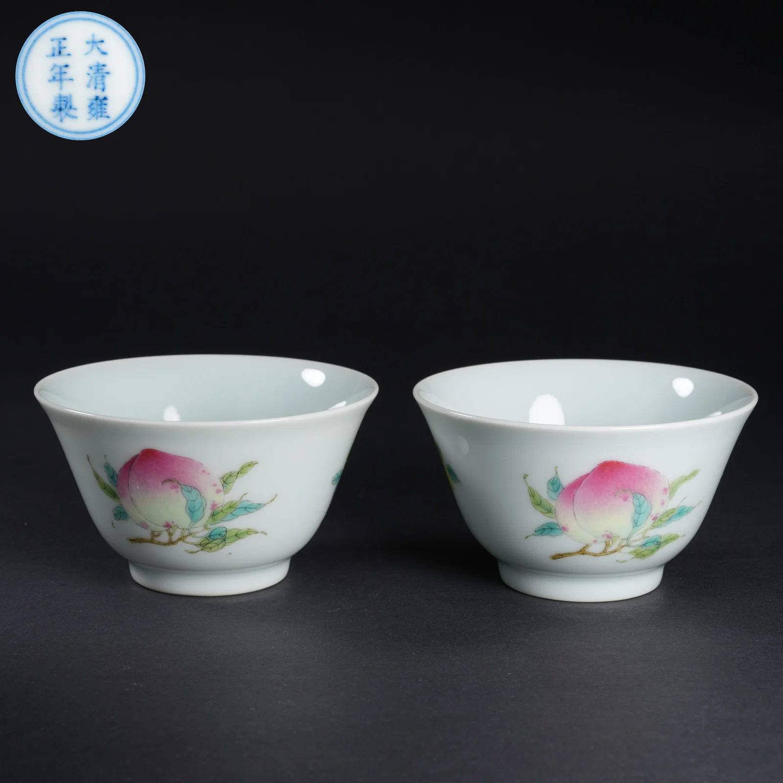 A SET OF FAMILLE-ROSE "THREE ABUNDANCES" MOTIF CUPS