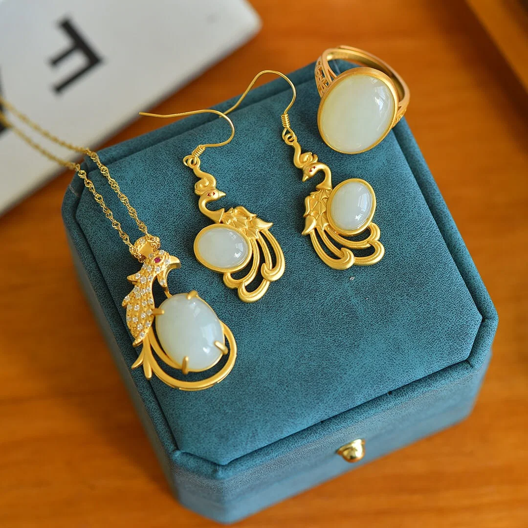 A Set of Fine Sterling Silver-Gold Plated Inlaid White Jade Jewelrys