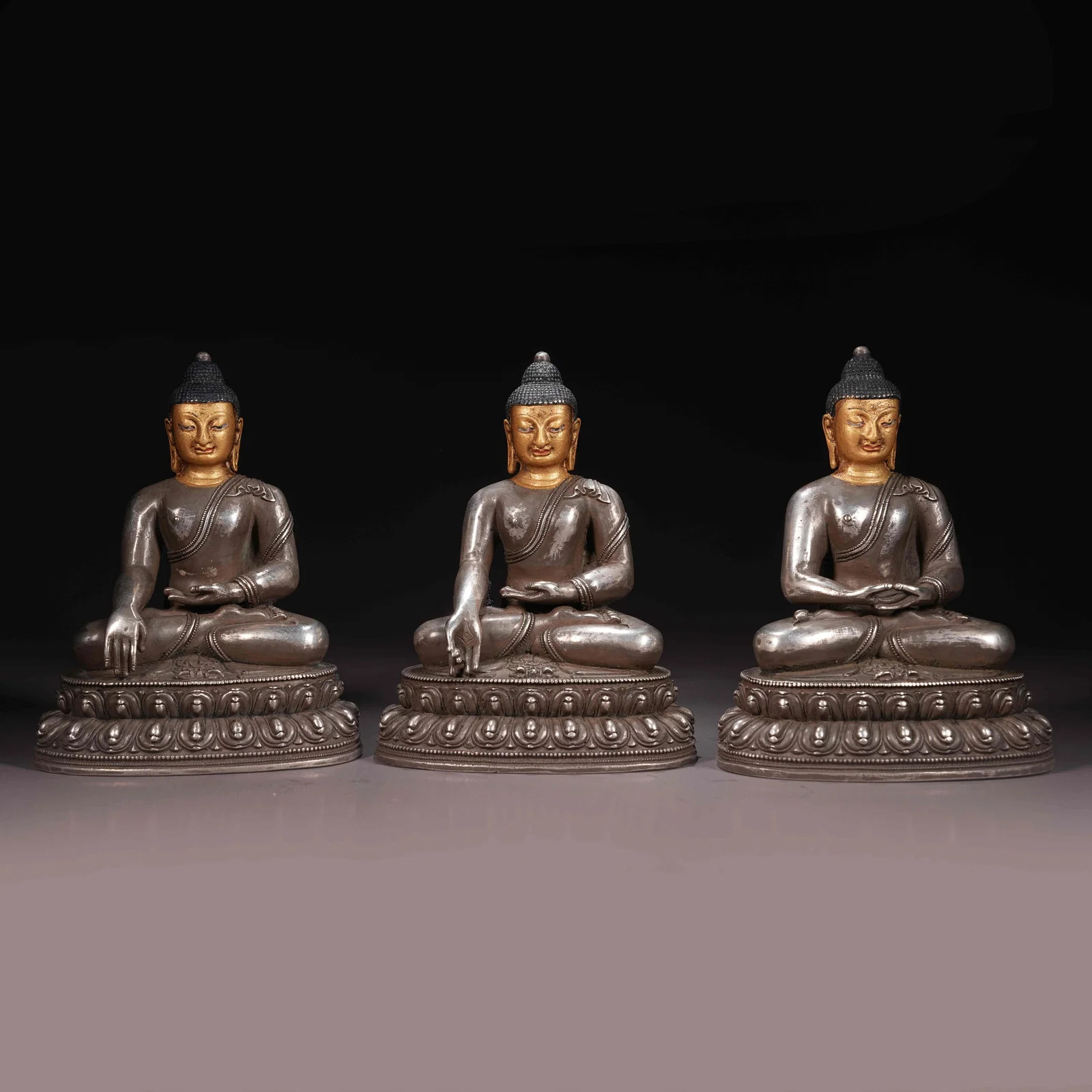 A SET OF GILT BRONZE THREE BUDDHAS