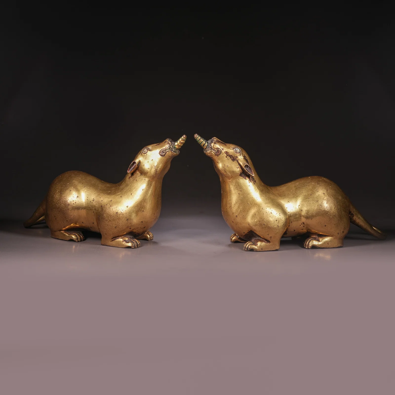 A SET OF GILT BRONZE TREASURE-SPOUTING MICE