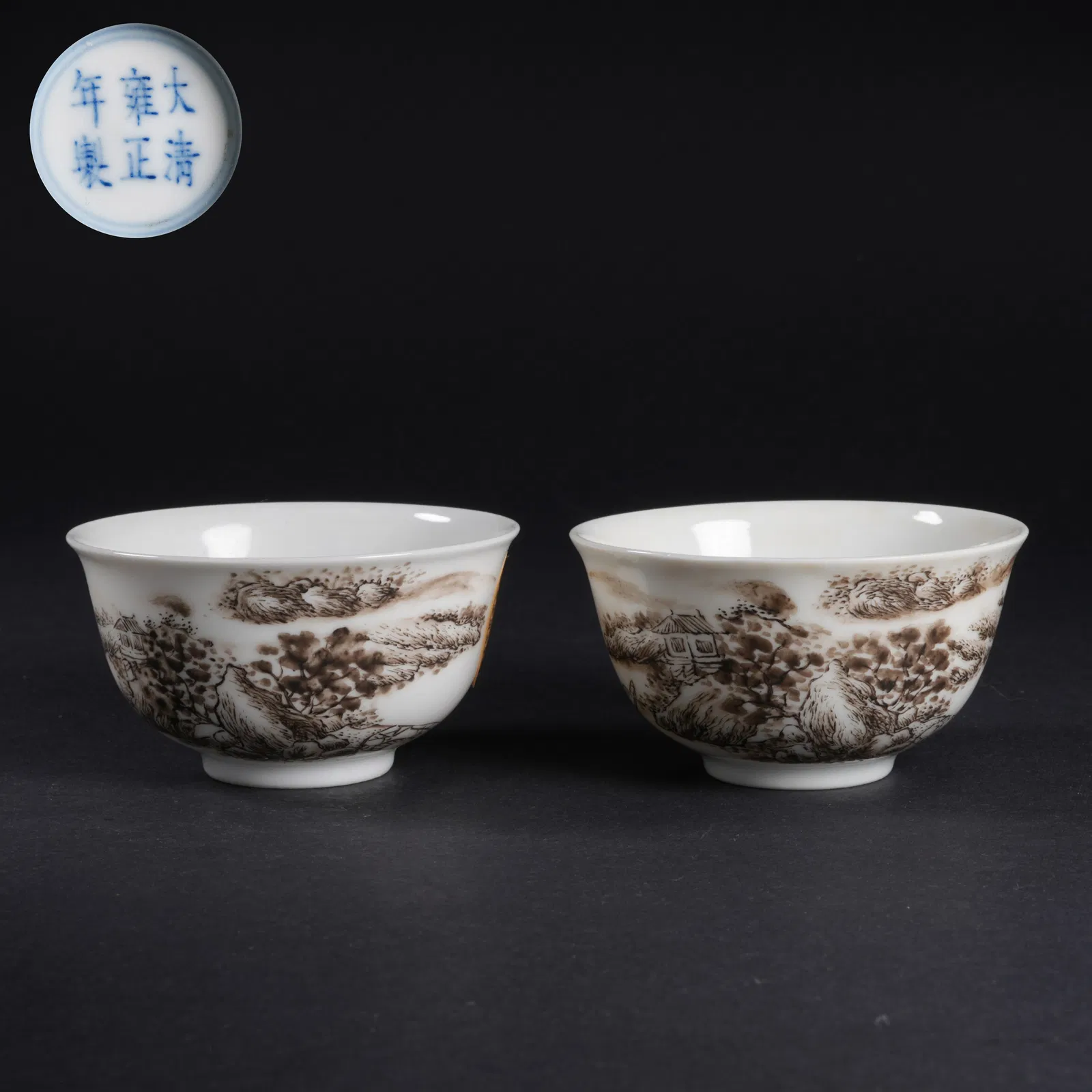 A SET OF INK-ENAMEL LANDSCAPE CUPS