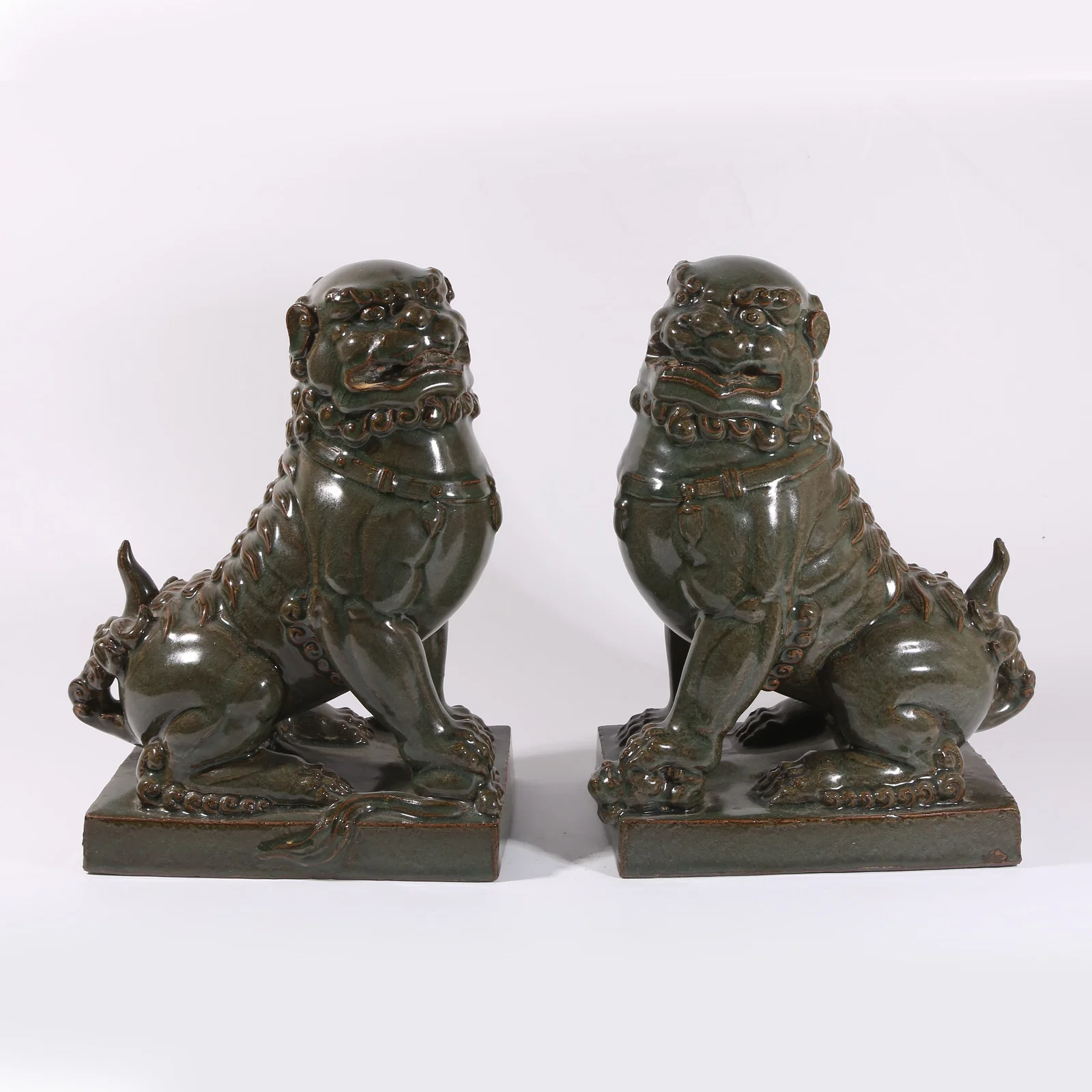 A SET OF LONGQUAN KILN LION ORNAMENTS