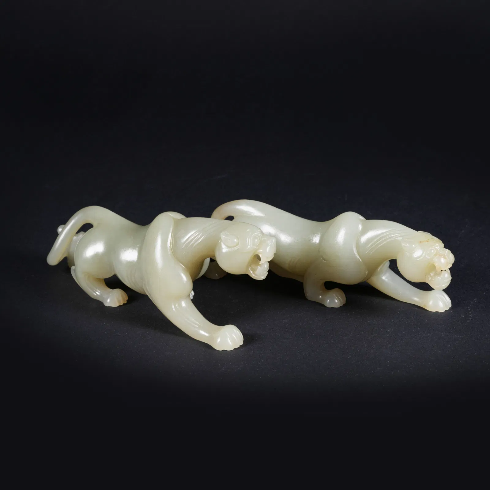 A SET OF MIDDLE-PERIOD JADE MYTHICAL-BEAST ORNAMENTS