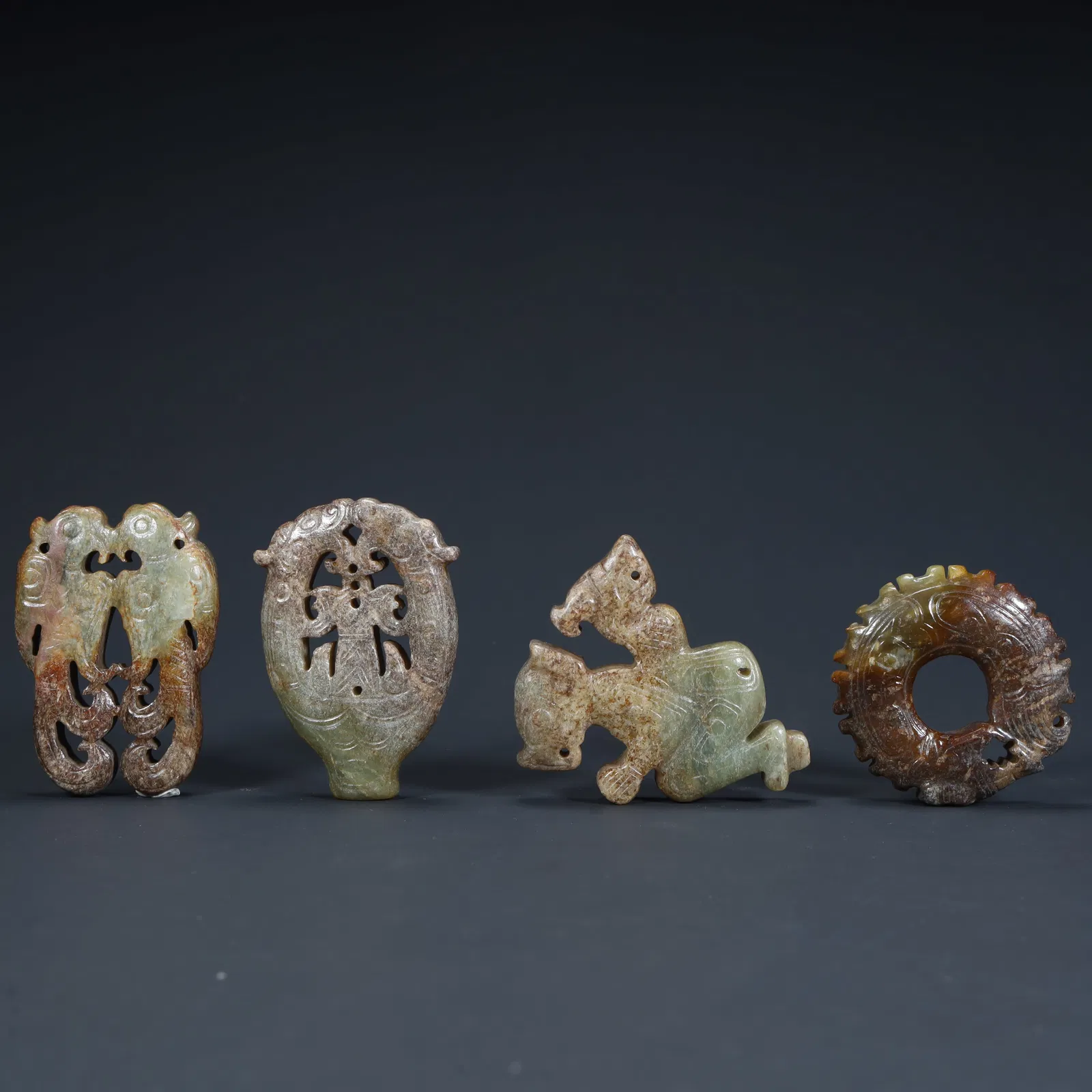 A set of Qing Dynasty ancient jade ornaments (four-piece set)
