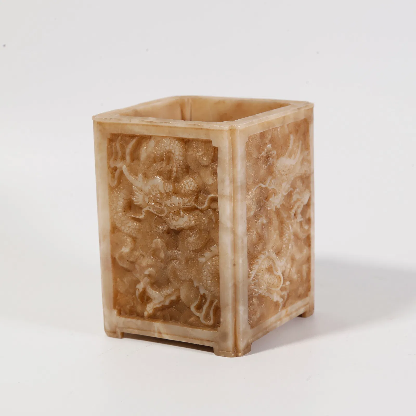 A SHOUSHAN STONE BRUSH POT WITH CLOUD-AND-DRAGON MOTIF