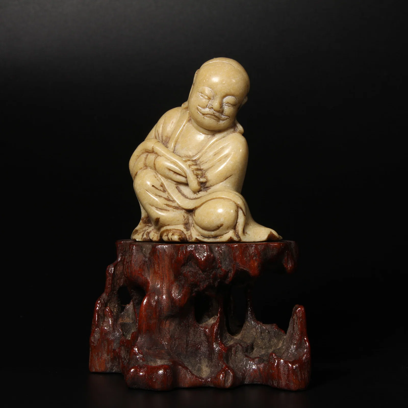 A SHOUSHAN STONE FIGURE OF A LUOHAN