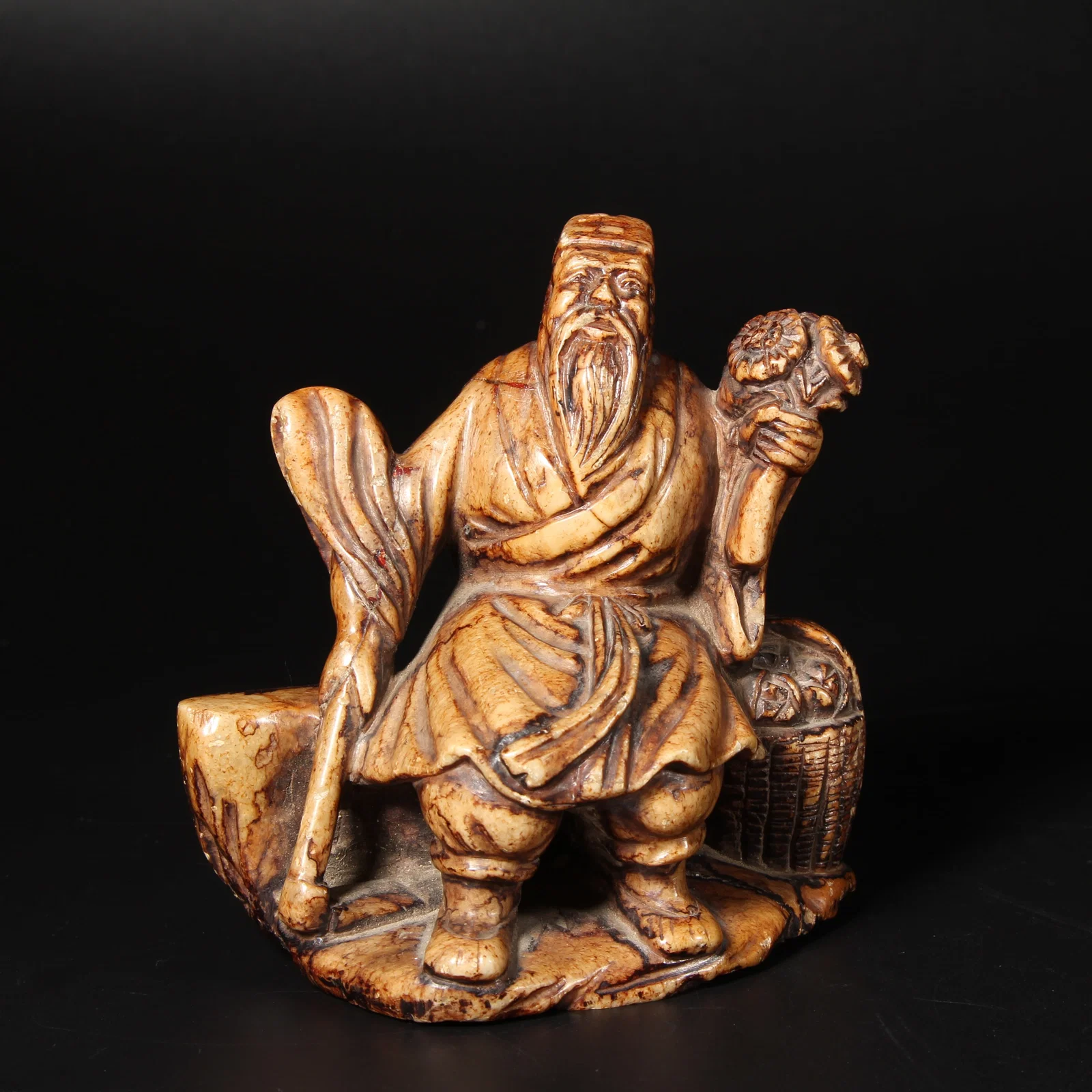 A SHOUSHAN STONE FIGURE OF THE MEDICINE KING