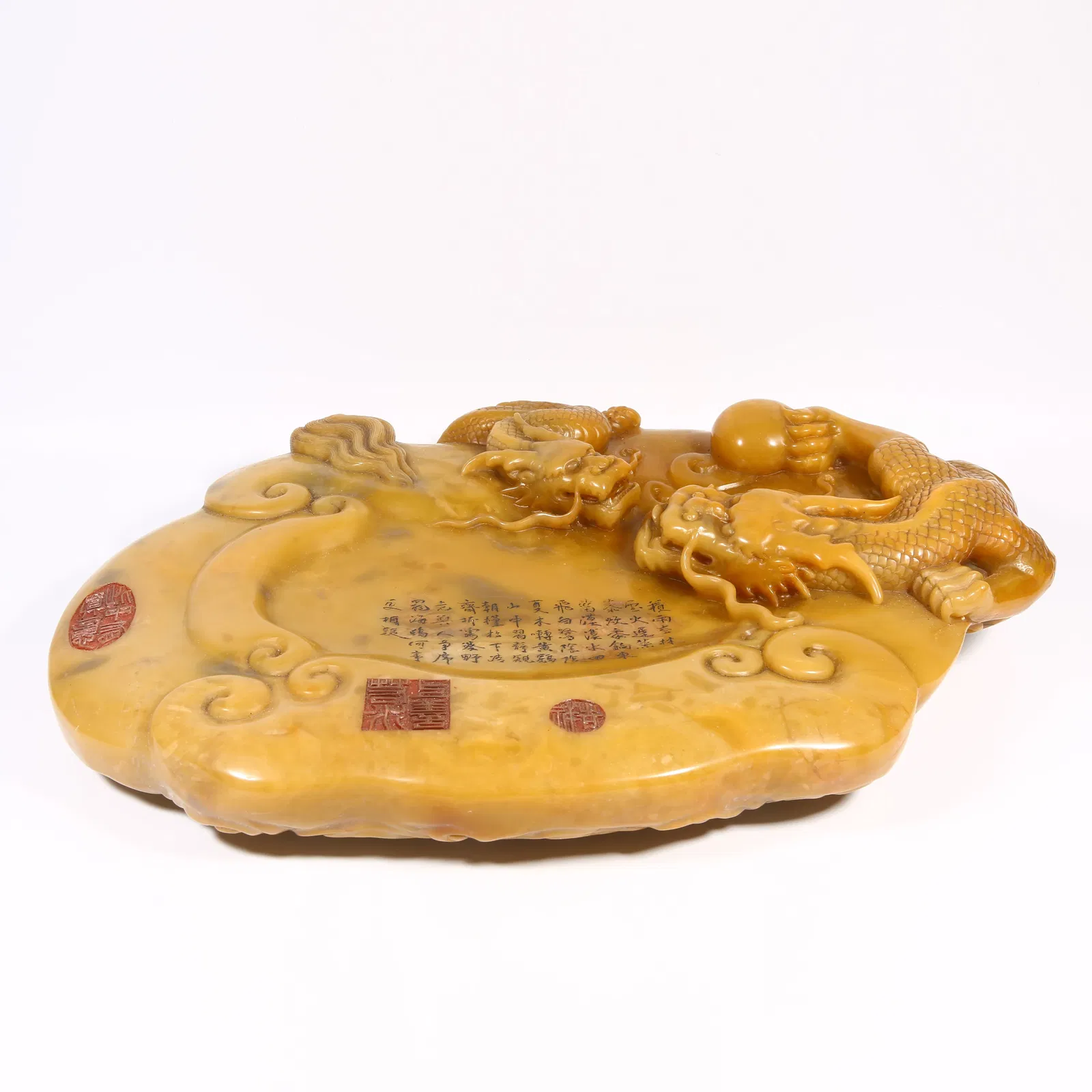 A SHOUSHAN STONE INKSTONE WITH DRAGON MOTIF