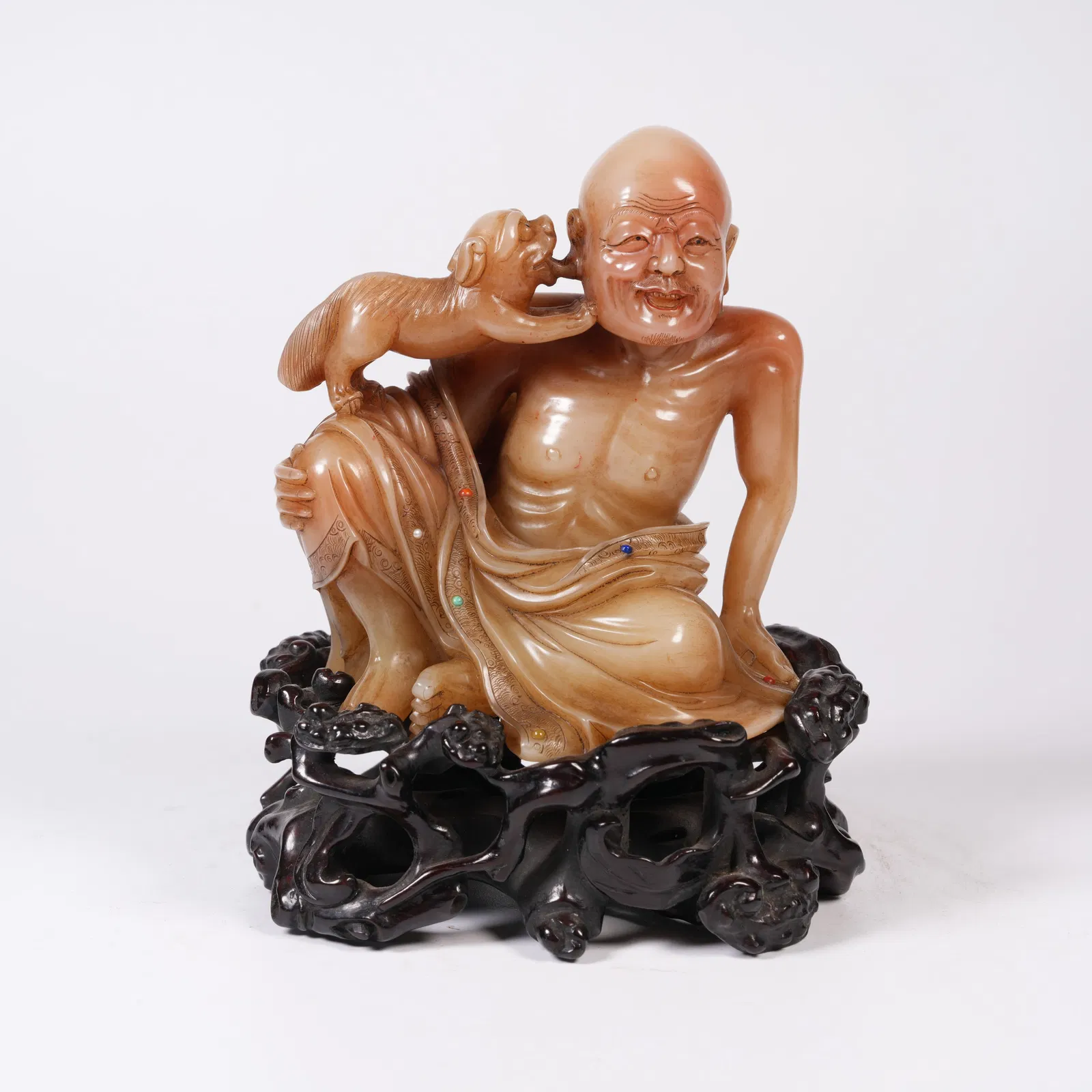 A SHOUSHAN STONE INLAID TREASURE SLENDER-LIMBED LUOHAN