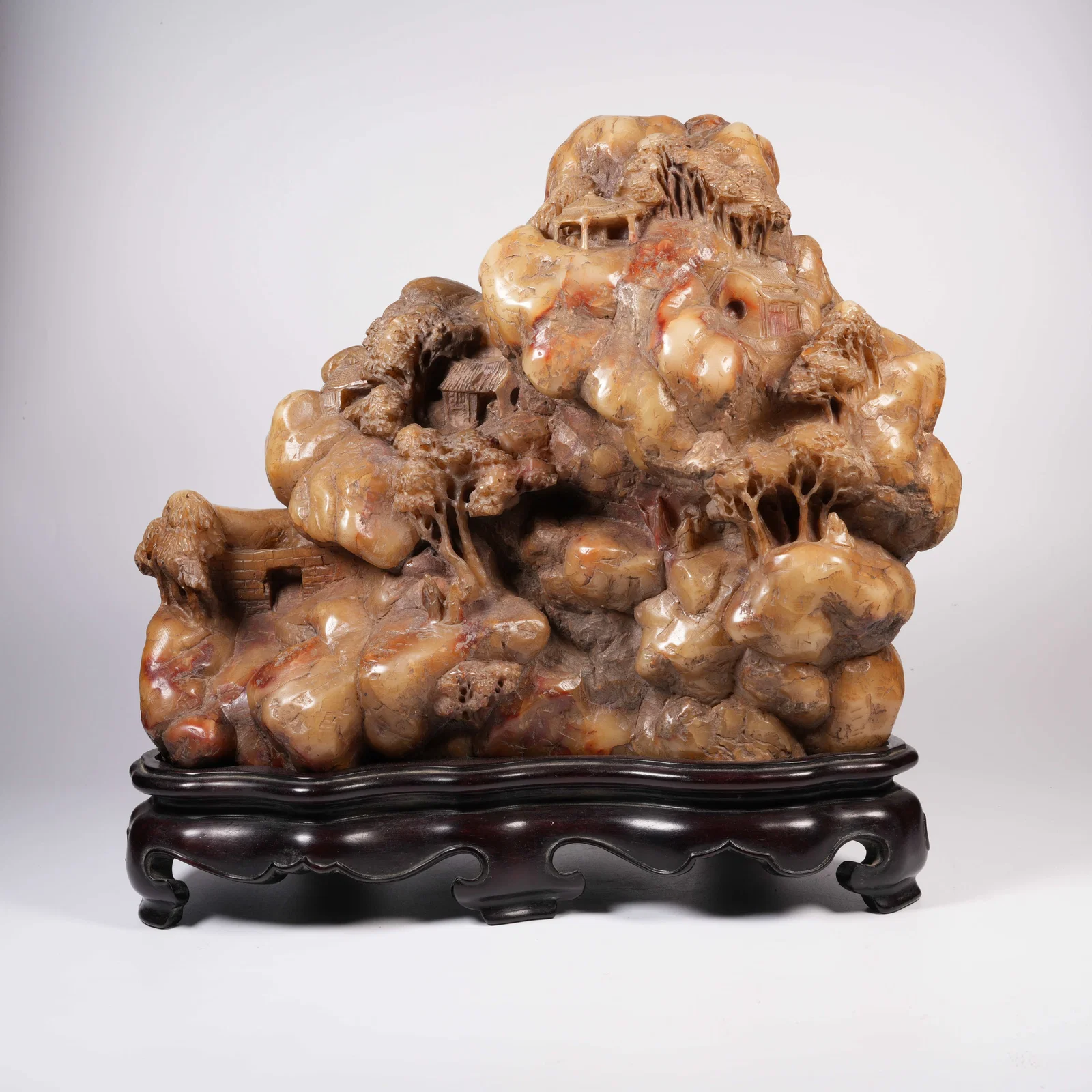 A SHOUSHAN STONE NATURAL-FORM MINIATURE ORNAMENT
