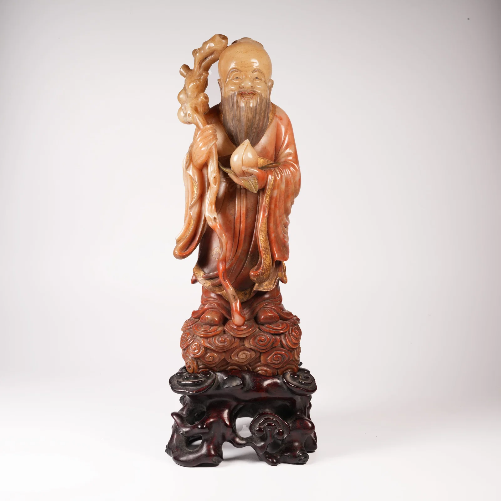 A SHOUSHAN STONE SHOUXING (GOD OF LONGEVITY) ORNAMENT