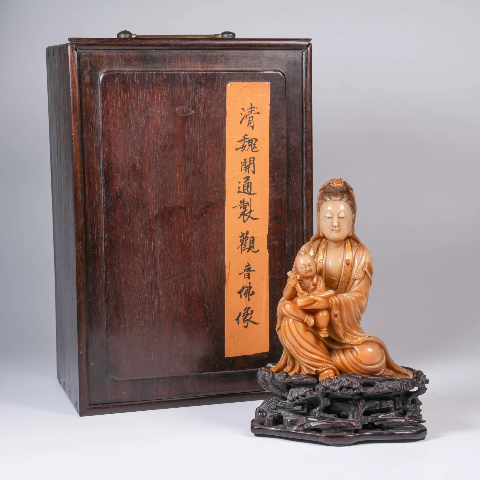 A SHOUSHAN STONE STANDING GUANYIN OF CHILD-GIVING