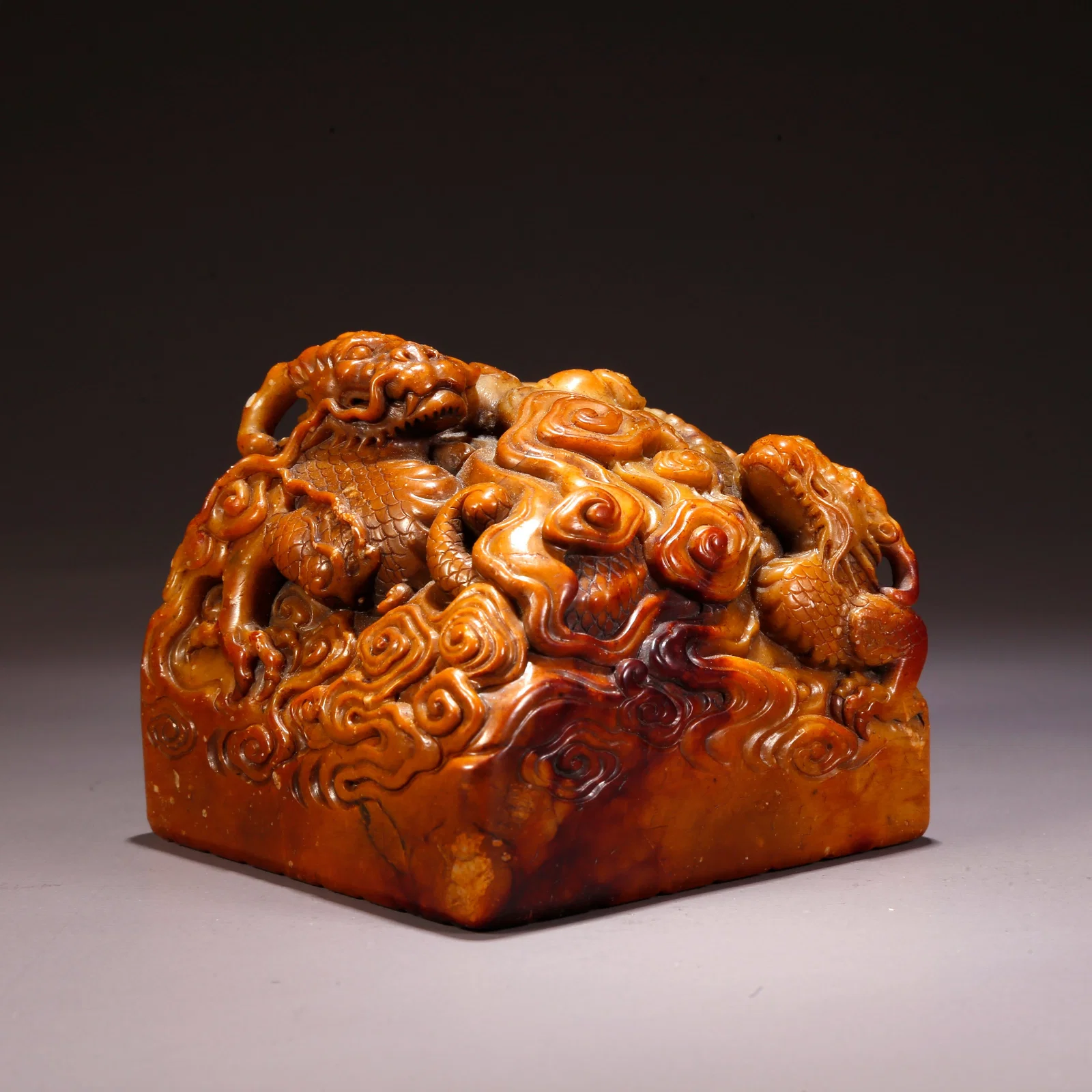 A SHOUSHAN TIANHUANG STONE CARVED SEAL WITH DRAGON MOTIF