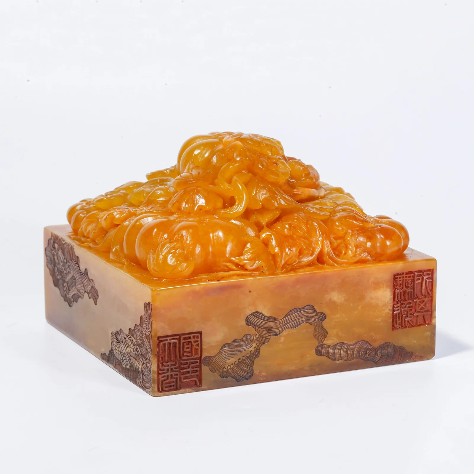 A SHOUSHAN TIANHUANG STONE SEAL WITH MELON AND FRUIT KNOB