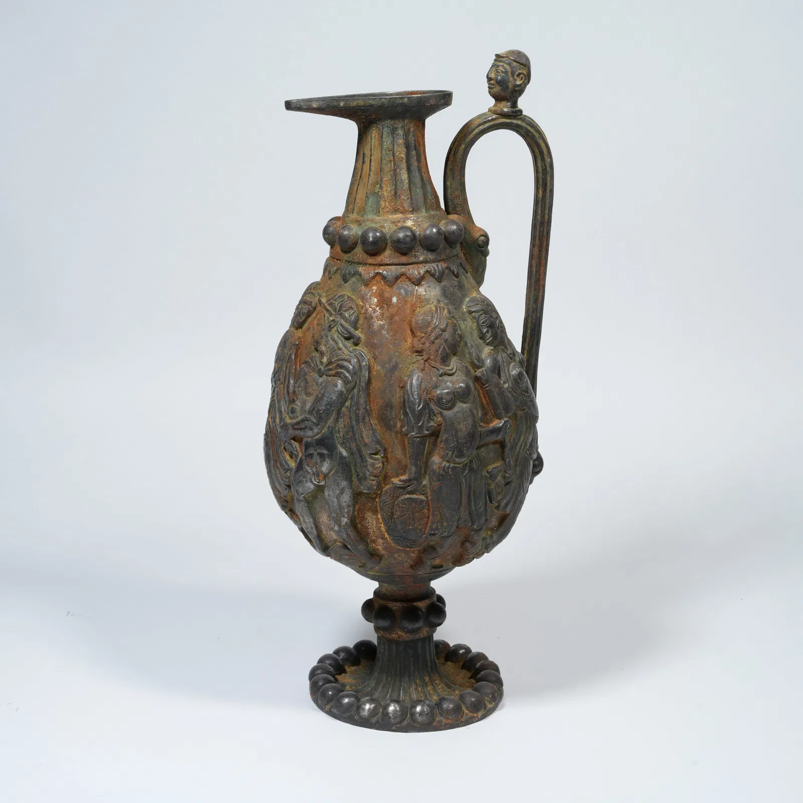 A SILVER EWER WITH FIGURE NARRATIVE DECORATION