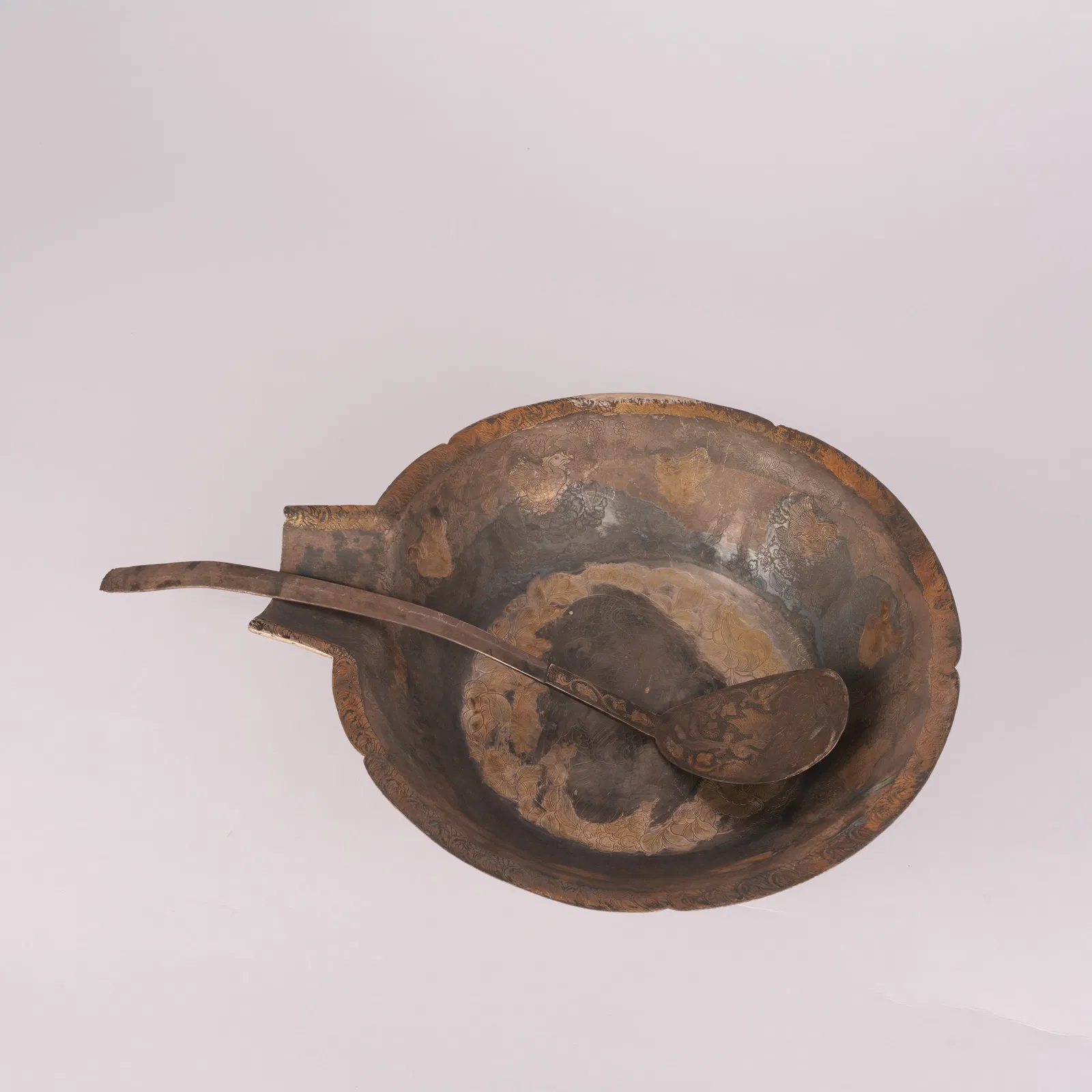 A SILVER GILT LADLE WITH FLORAL AND ANIMAL DESIGN, TANG DYNASTY