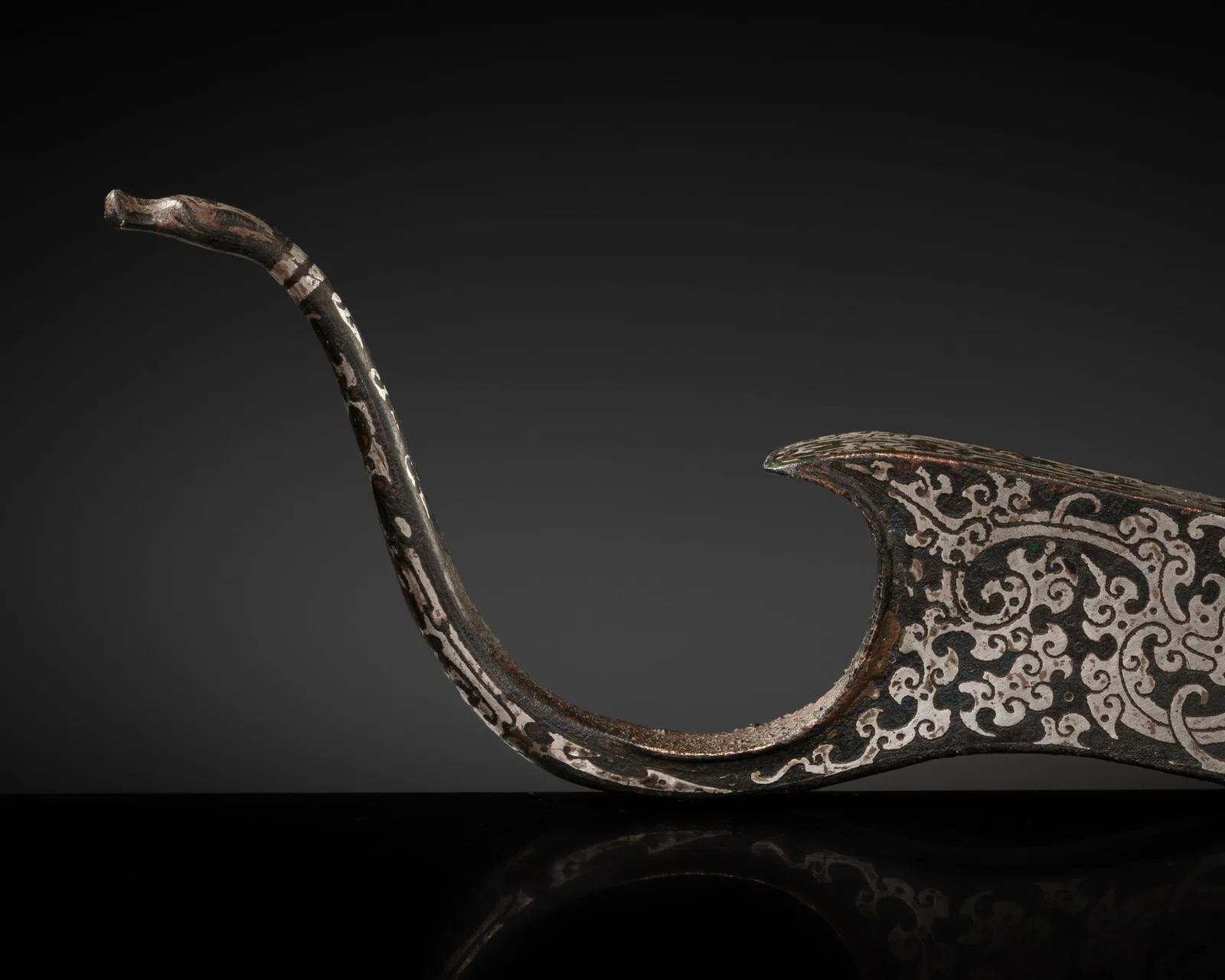 A SILVER-INLAID BRONZE CROSSBOW SUPPORT, WARRING STATES PERIOD