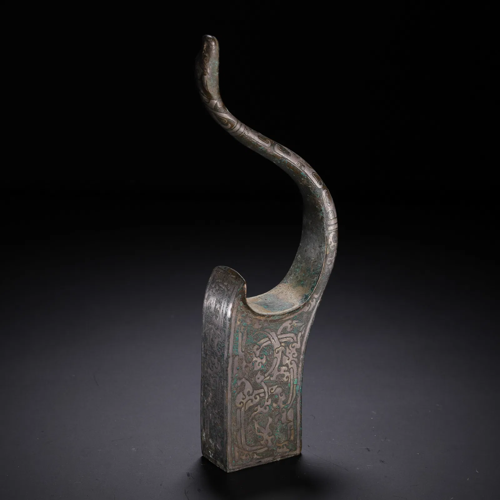 A SILVER INLAID BRONZE ORNAMENT