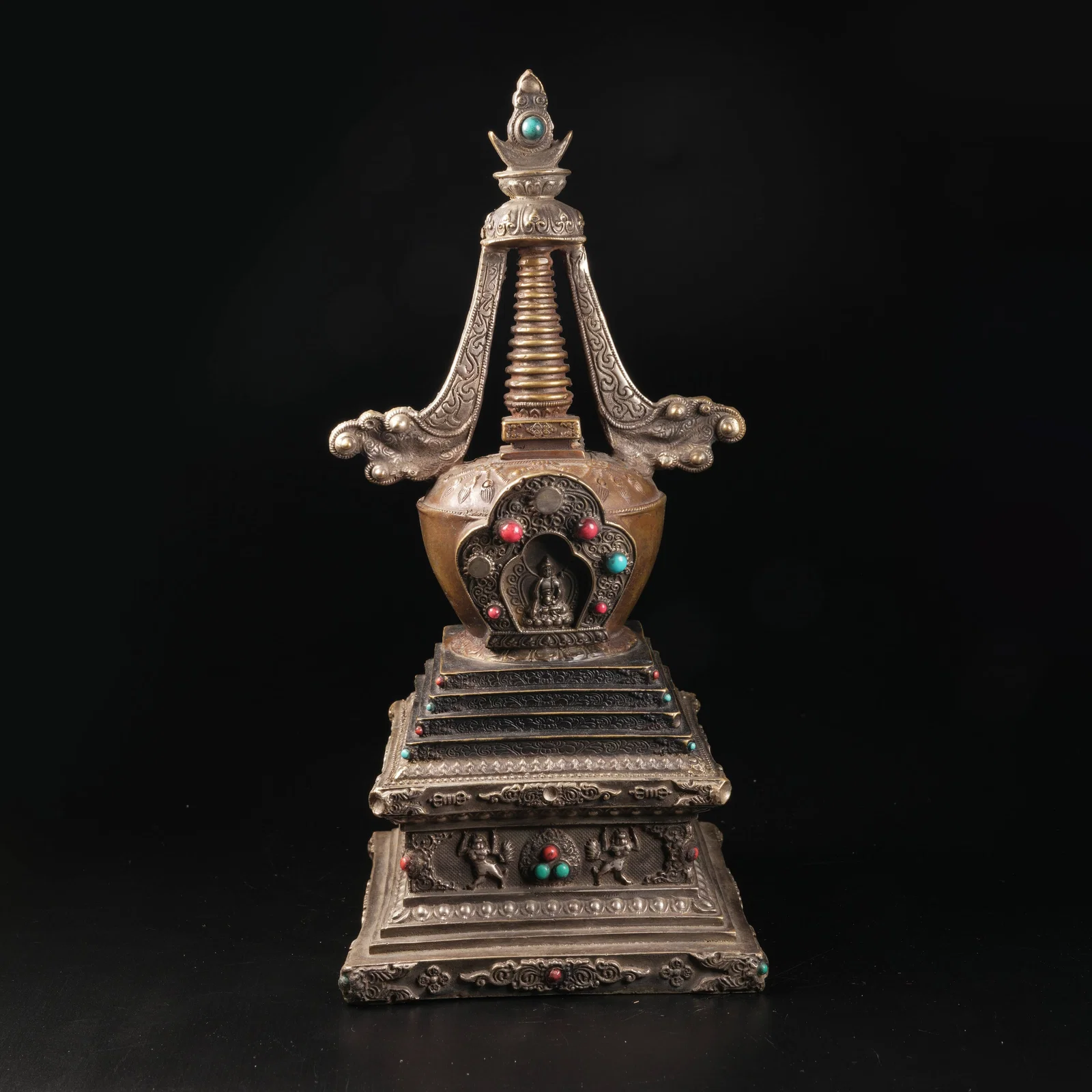 A SILVER INLAID BUDDHIST STUPA