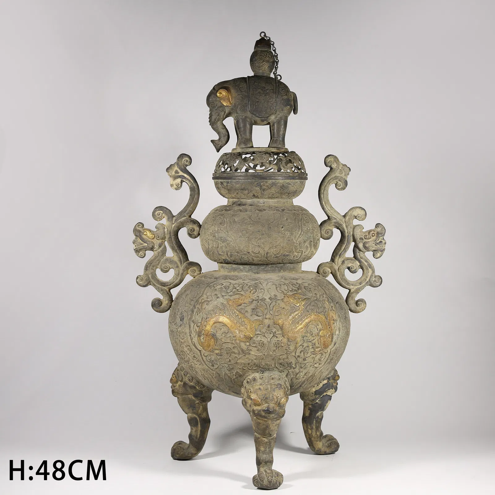 A SILVER PARTIAL GILDED DRAGON PATTERN INCENSE BURNER