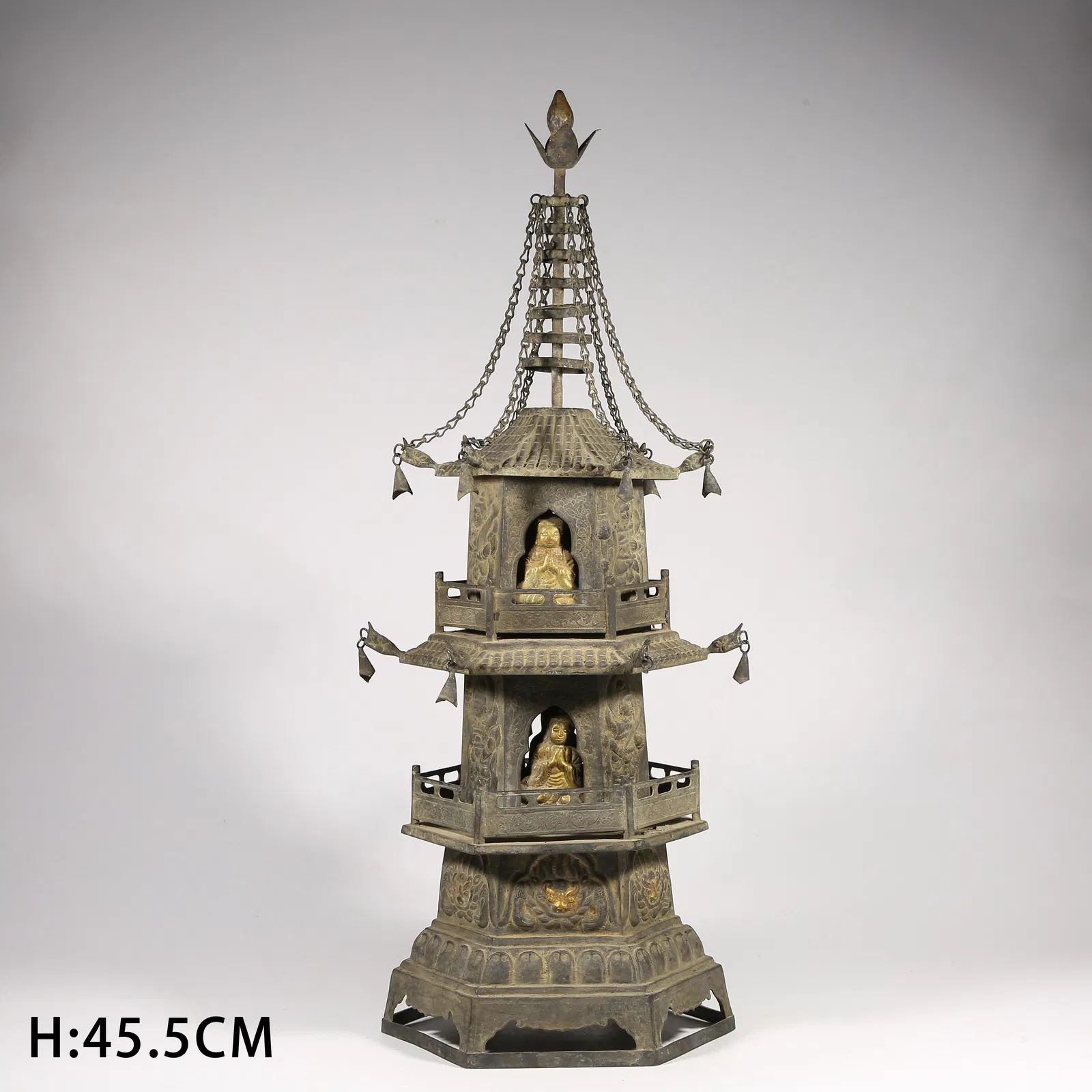 A SILVER PARTIAL GILDED PAGODA