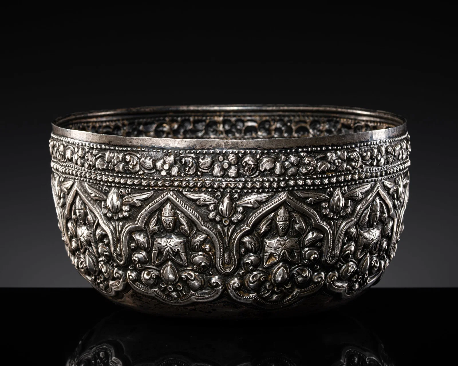 A SILVER REPOUSSÉ THEPPHANOM BOWL, RATTANAKOSIN PERIOD