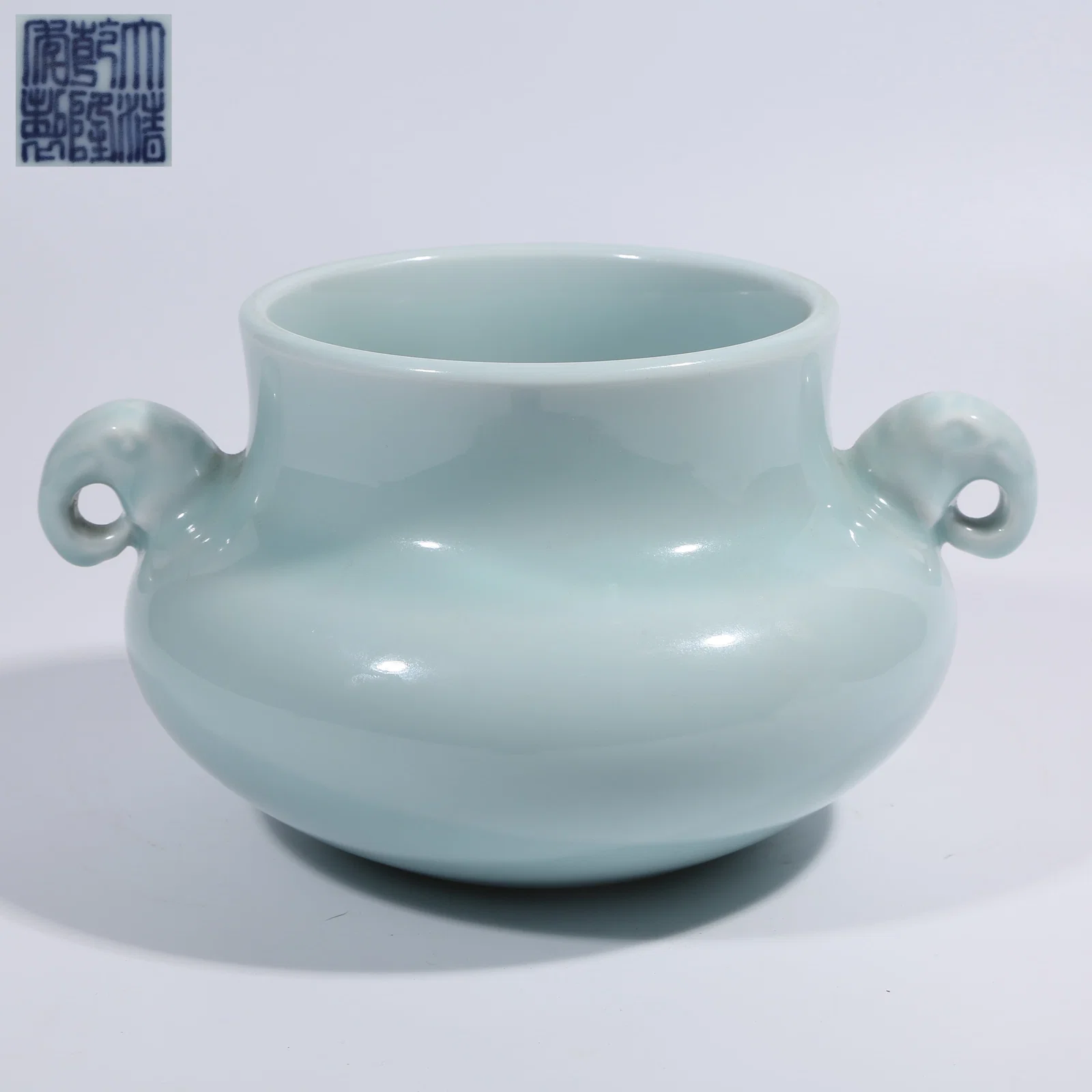 A SKY-BLUE GLAZE ZUN WITH ELEPHANT-HEAD HANDLES