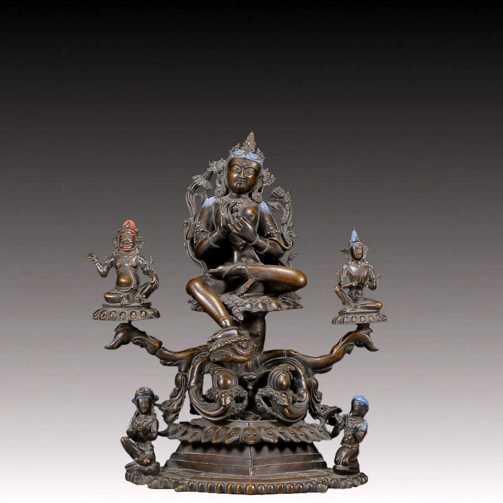 A Solemn Bronze Statue of Green Tara