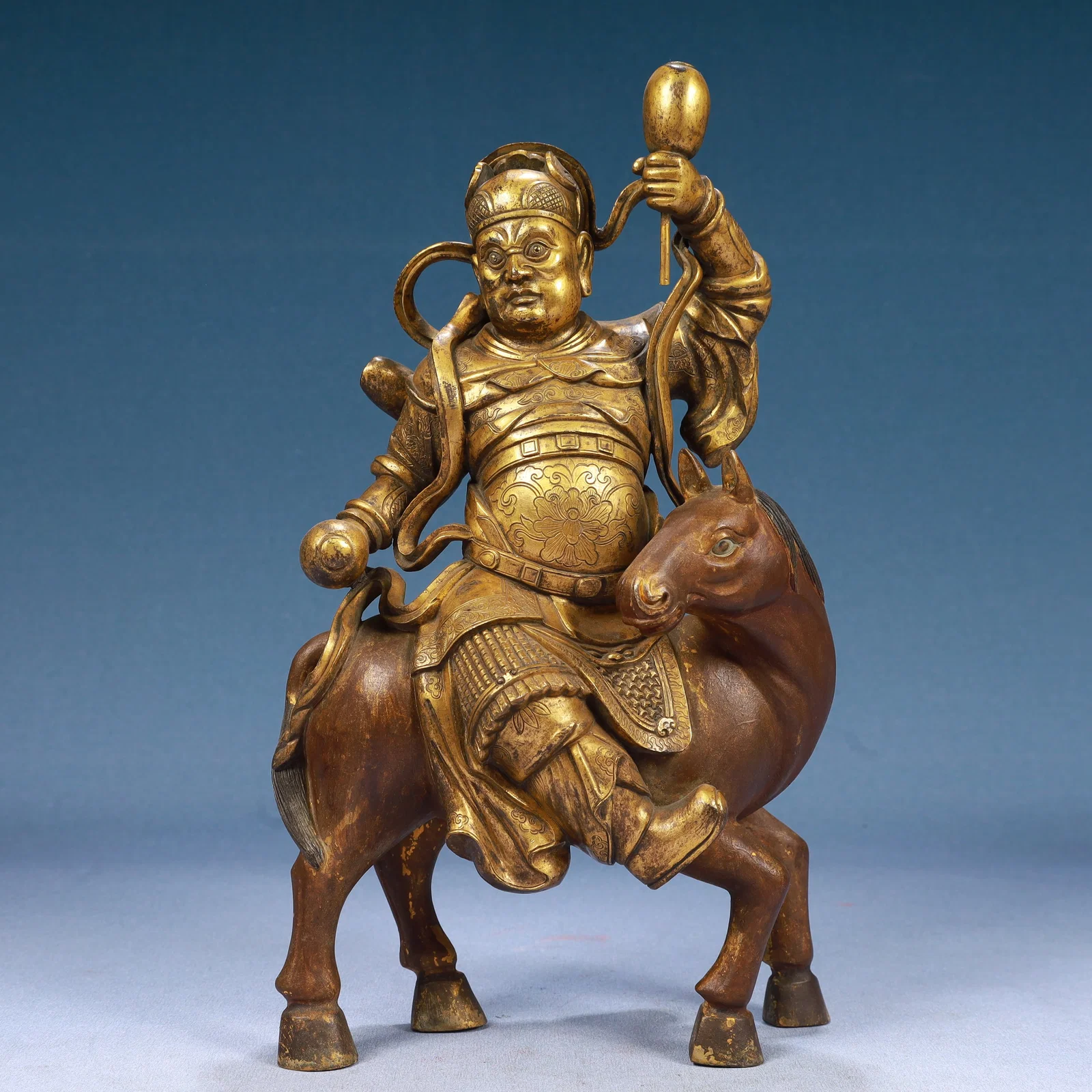 A Solemn Gilt Bronze Statue of Dharma Protector Rides the Horse