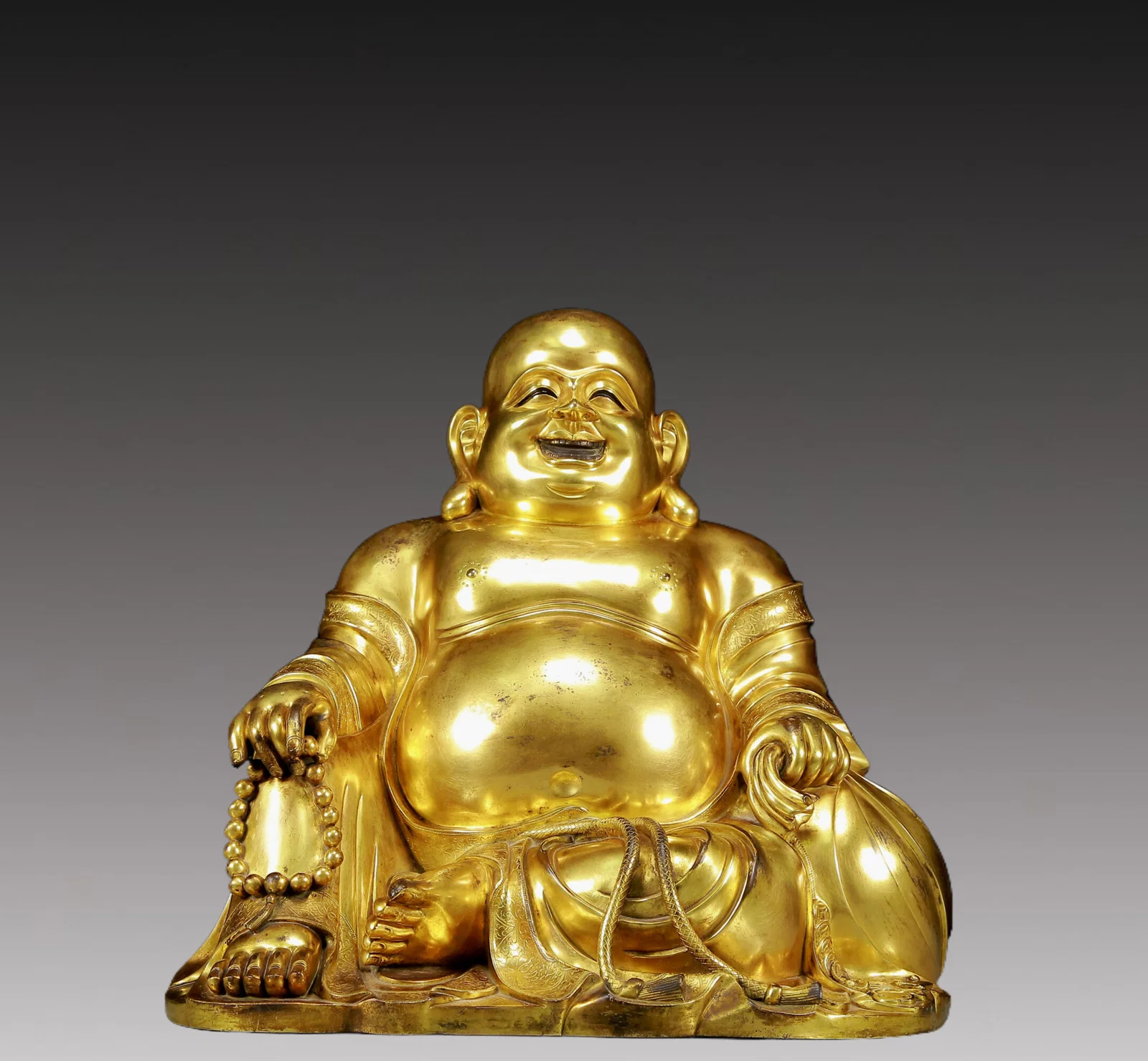 A Solemn Gilt Bronze Statue of Maitreya Buddha