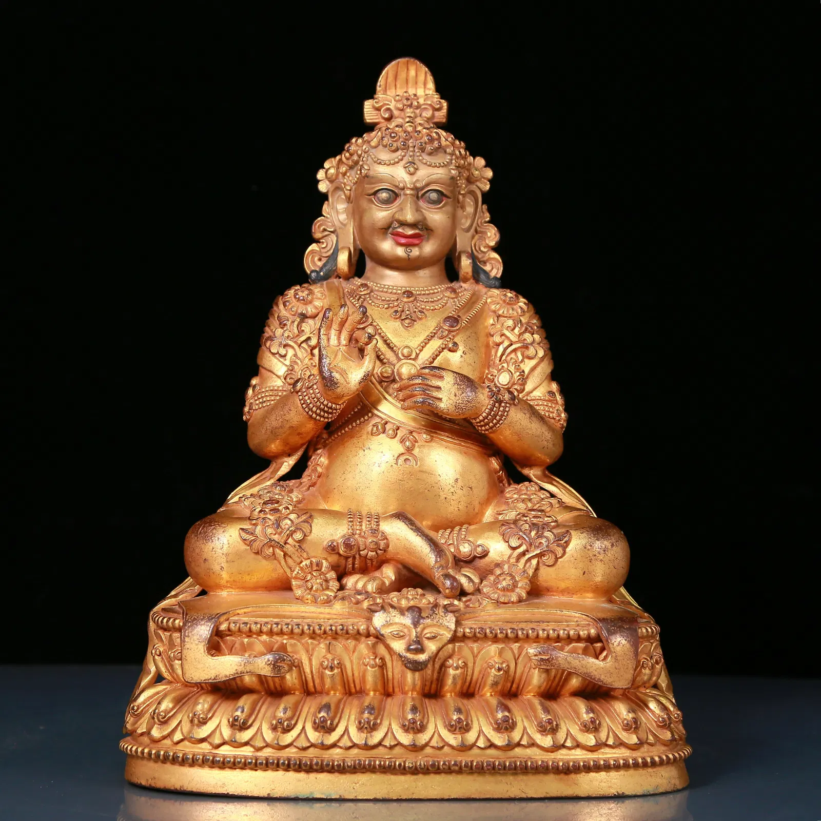 A solemn gilt bronze Vajra statue