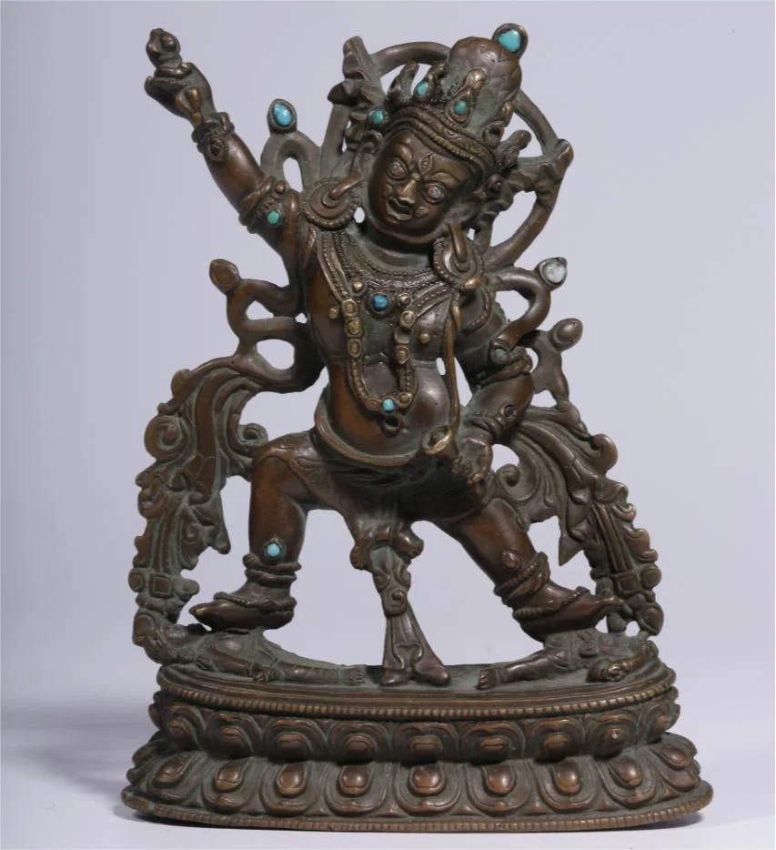 A statue of the Bodhisattva with a gold bronze inlaid turquoise Vajra hand from the Qing Dynasty