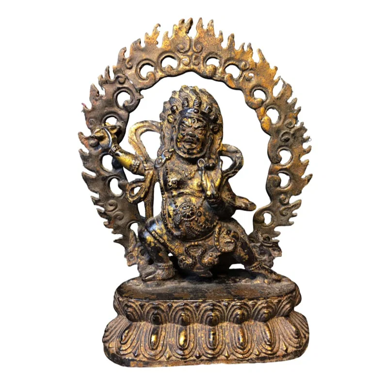 A statue of Tibetan Buddhist deity made of pure copper.
